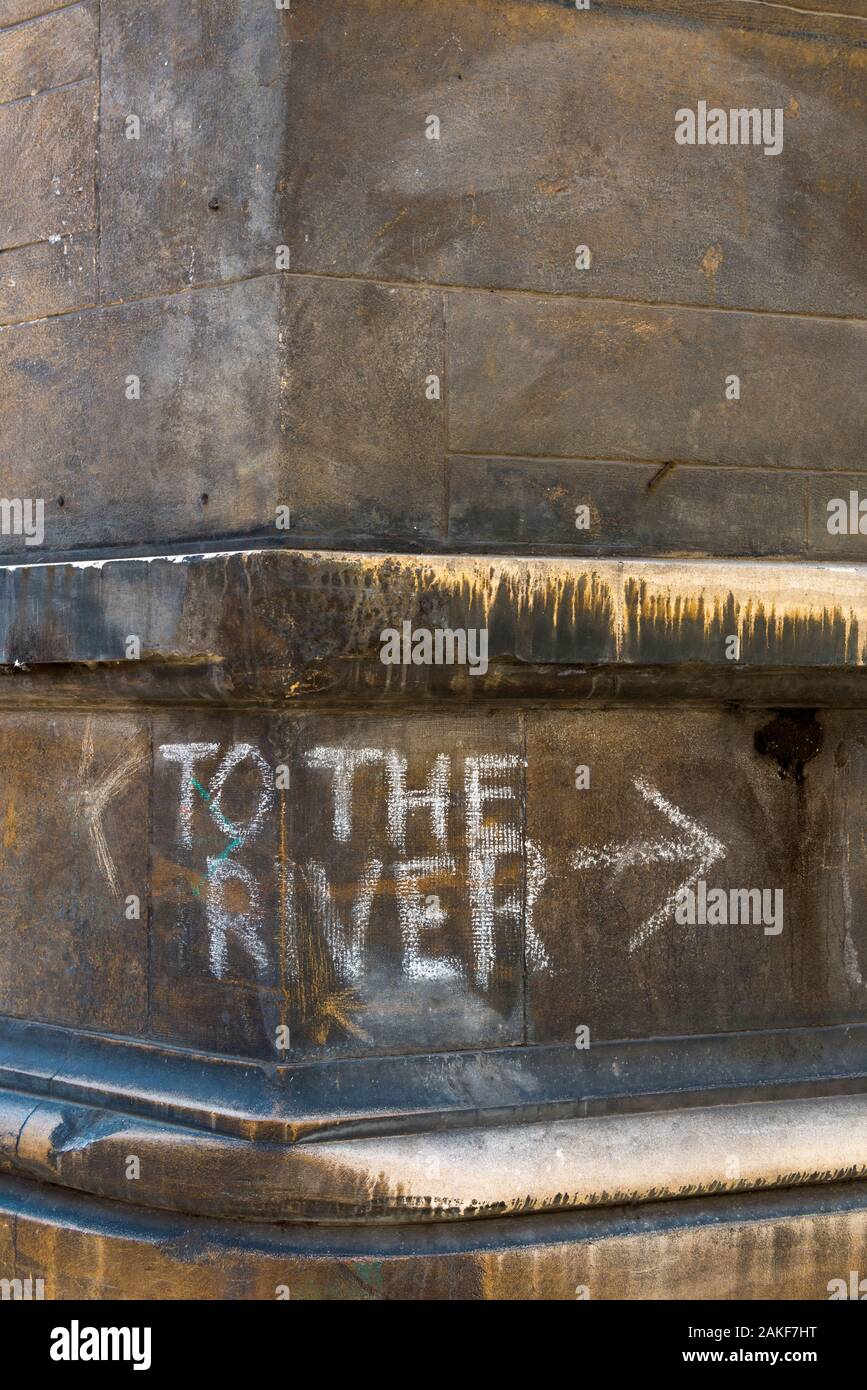 UK, England, Cambridgeshire, Cambridge, Trinity Street, To The River chalked on college wall Stock Photo