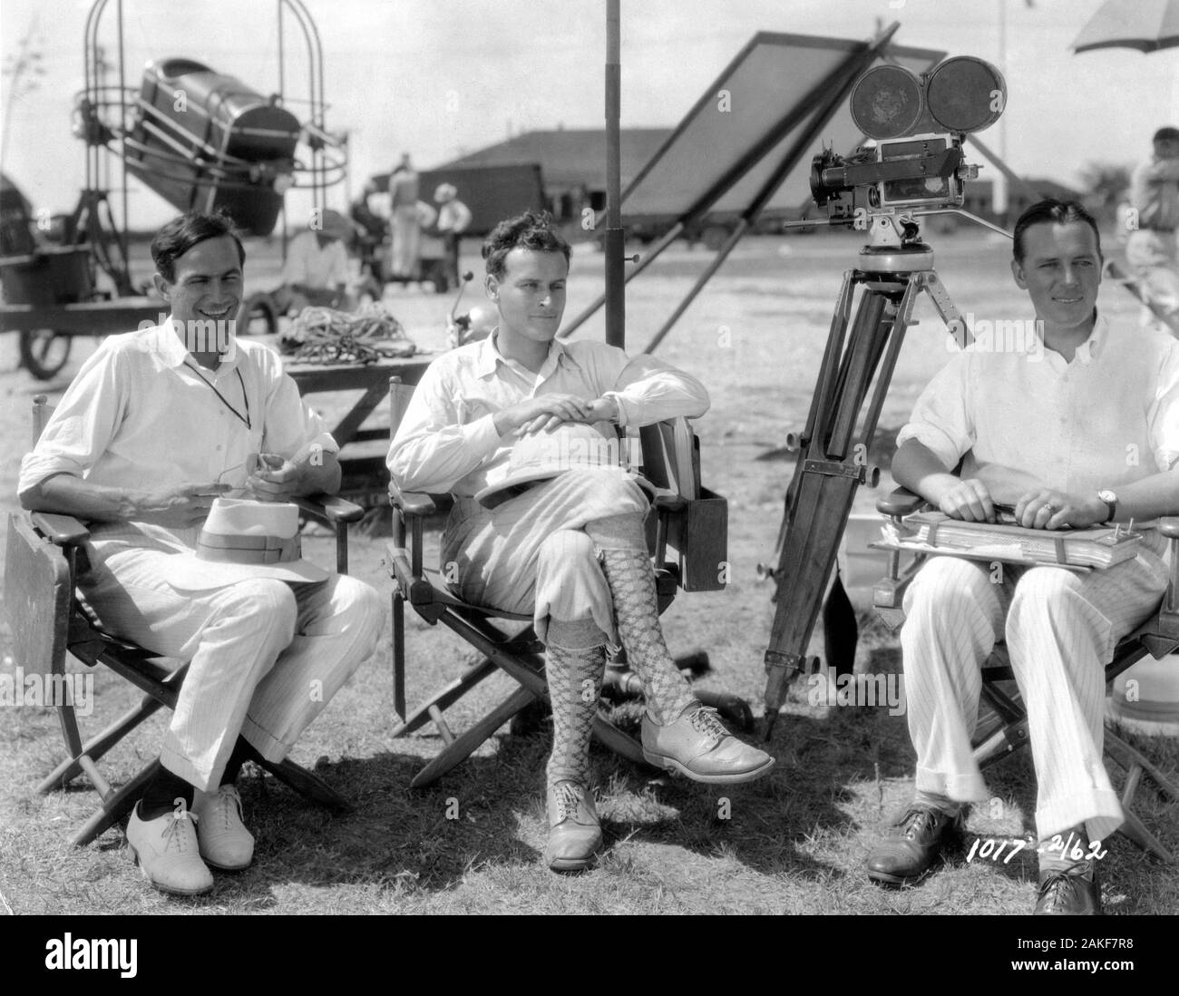 Producer LUCIEN HUBBARD Director WILLIAM A. WELLMAN and author JOHN MONK SAUNDERS on location in San Antonio Texas during location filming of WINGS 1927 story John Monk Saunders producer Lucien Hubbard Silent Movie with Musical Score and Sound Effects Paramount Famous Lasky Corporation / Paramount Pictures Stock Photo