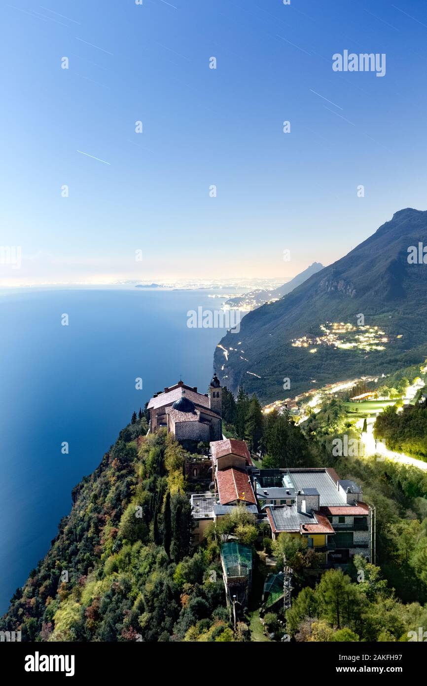 The Sanctuary of Montecastello rises on a spike of rock overlooking Lake Garda. Tignale, Brescia province, Lombardy, Italy, Europe. Stock Photo