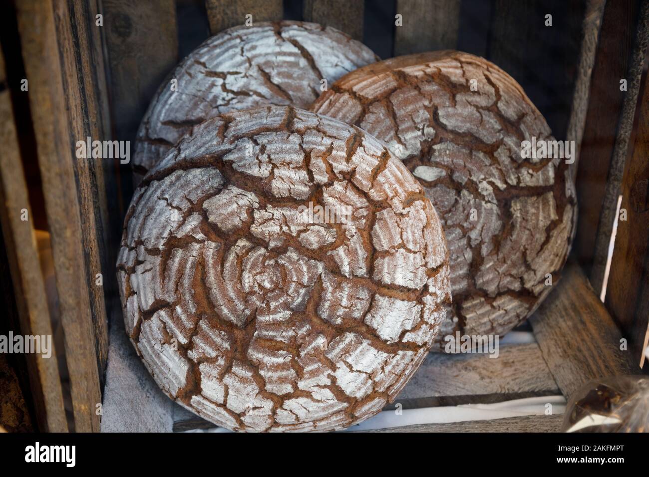Freshly baked traditional German sourdough rye bread round loafs for sale at market in Rothenburg ob der Tauber, Bavaria, Germany, Europe Stock Photo