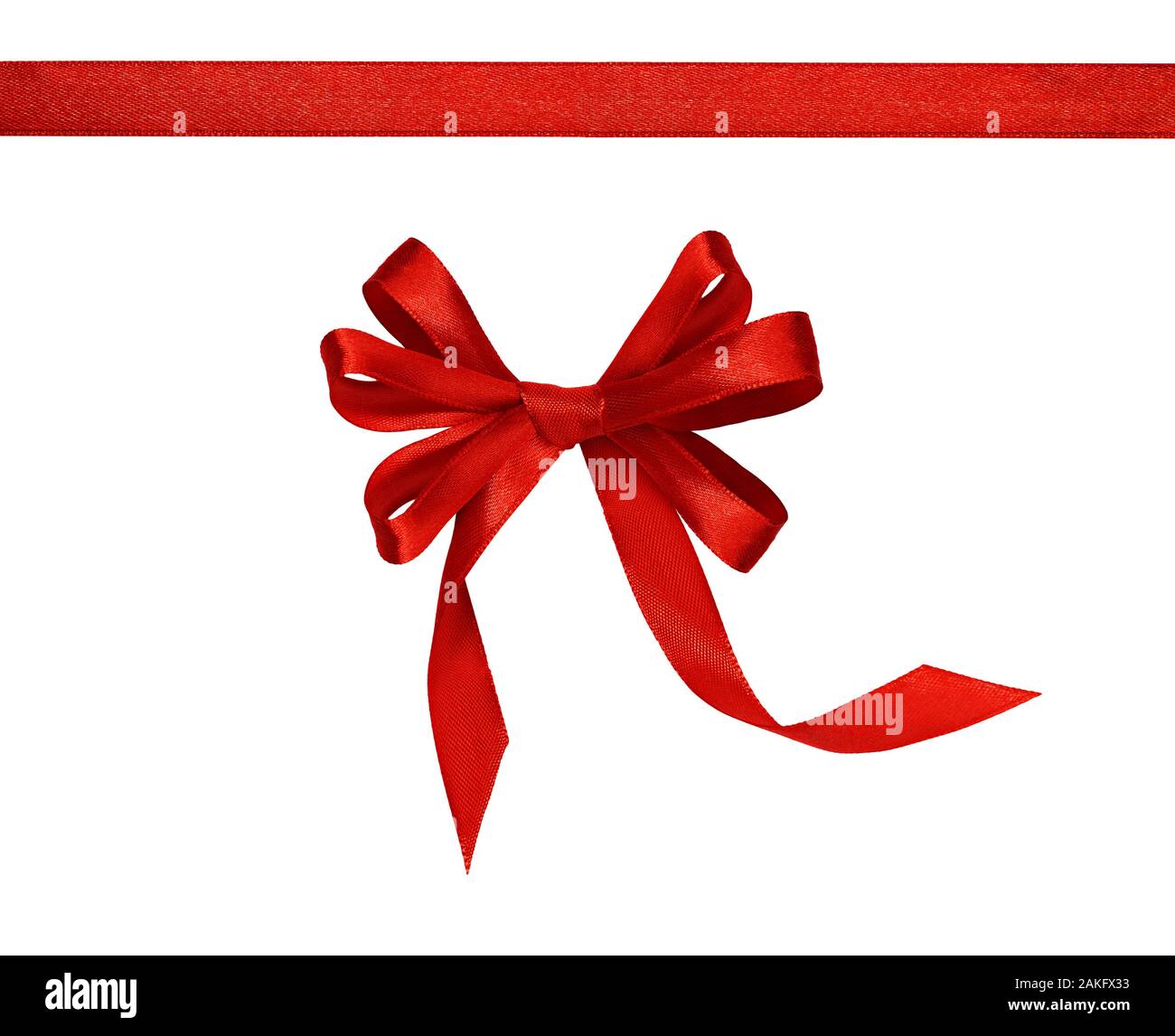 Red satin ribbon and a bow isolated on white background Stock Photo - Alamy