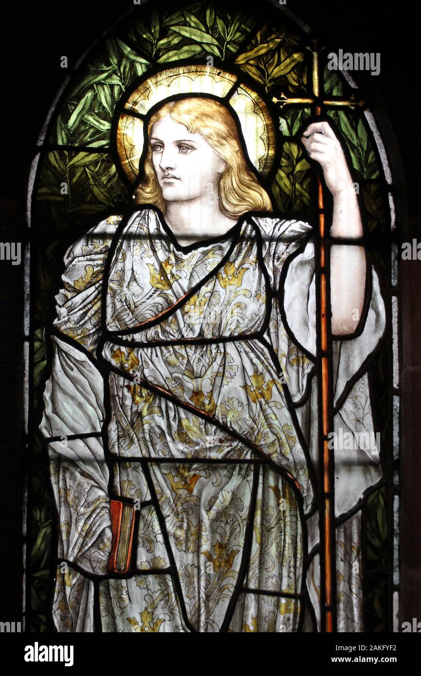 Stained Glass Window depicting Faith - one of the three theological virtues Stock Photo