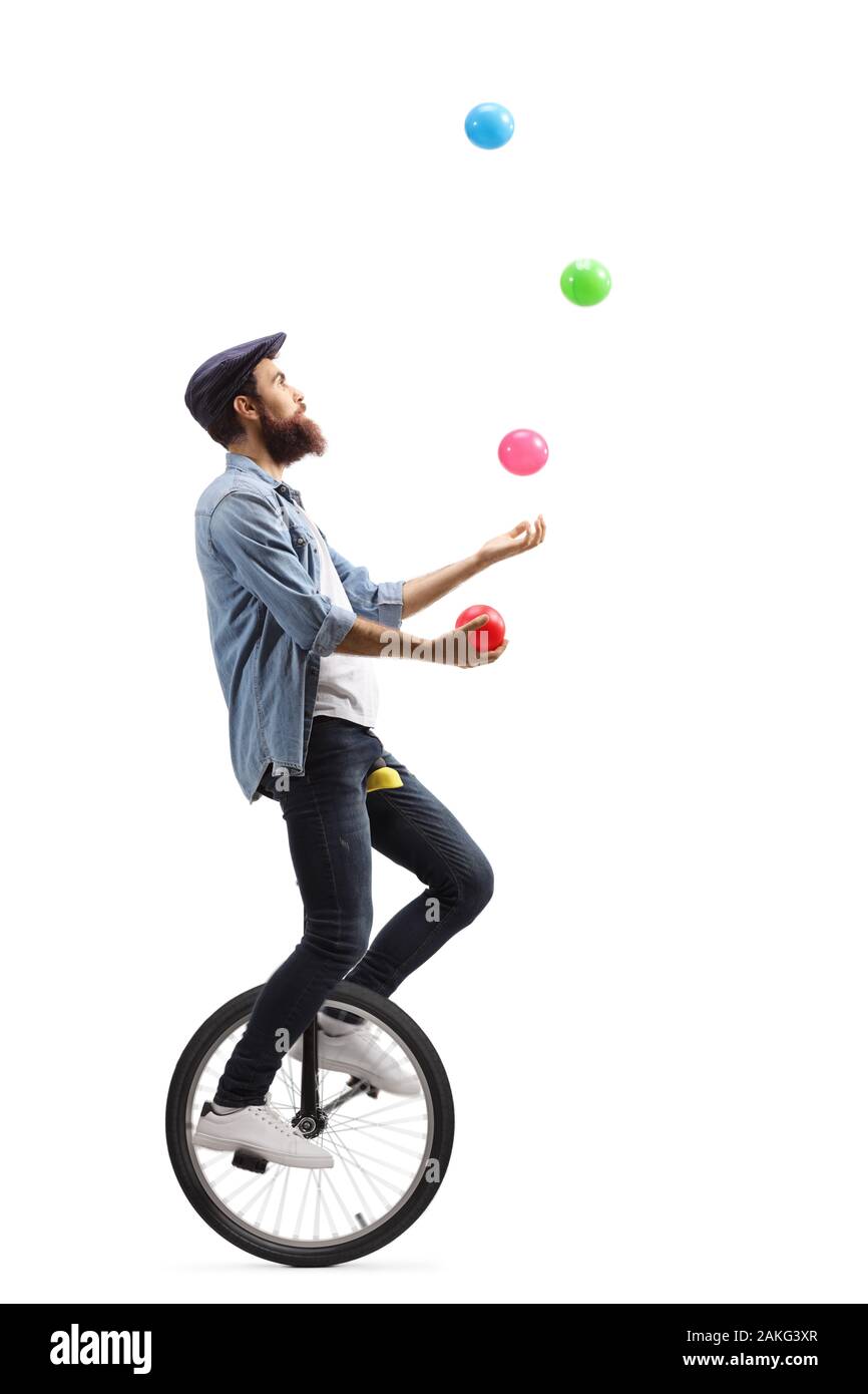 Man on unicycle juggling hires stock photography and images Alamy