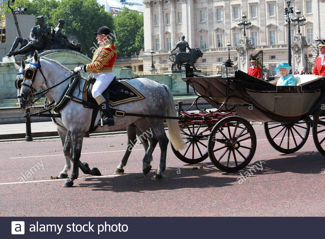 The annual Trooping the Colour has taken place in London in honour of Queen Elizabeth's birthday. Thousands lined the streets to welcome Her Majesty a Stock Photo