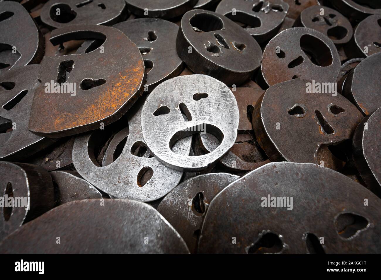Close up of the steel plates reproducing screaming faces in an art installation in the Berlin Jewish Museum, and describing the suffering of the Jews Stock Photo
