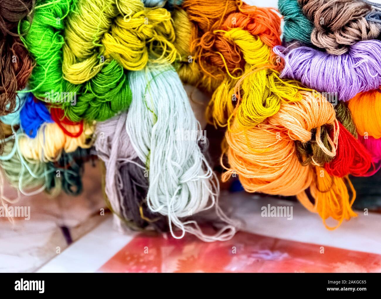 Colourful embroidery thread and silk for use on canvas, Hanoi Vietnam Stock  Photo - Alamy