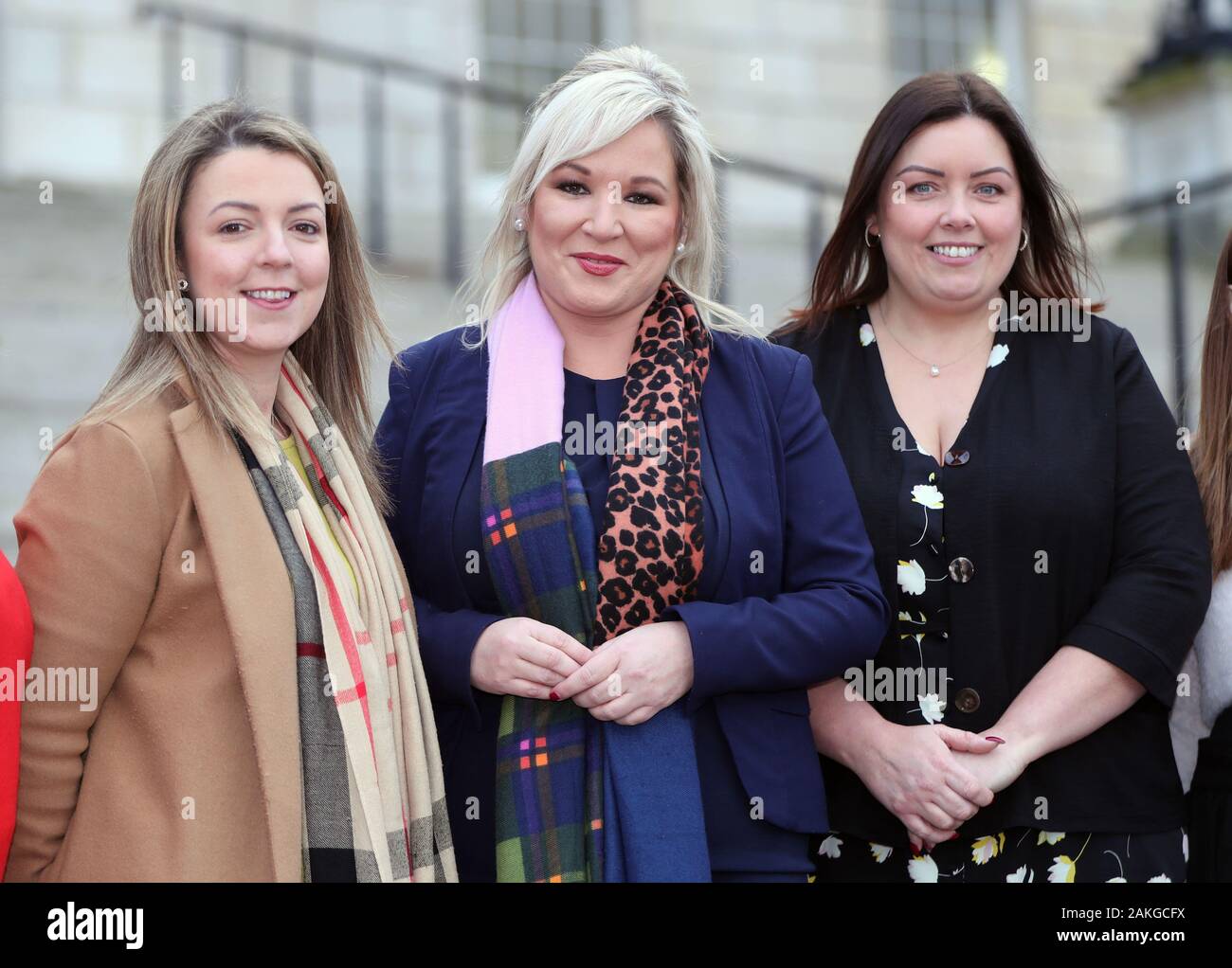 Sinn Fein deputy leader Michelle O'Neill unveils the partys two newly co-opted Members of the Legislative Assembly (MLA), Liz Kimmins (left) and Deirdre Hargey (right) outside the Stormont Parliament buildings in Belfast, as the deadline approaches for the resumption of a power sharing assembly in Northern Ireland. PA Photo Photo. Picture date: Thursday January 9, 2020. See PA story ULSTER Politics . Photo credit should read: Niall Carson/PA Wire Stock Photo