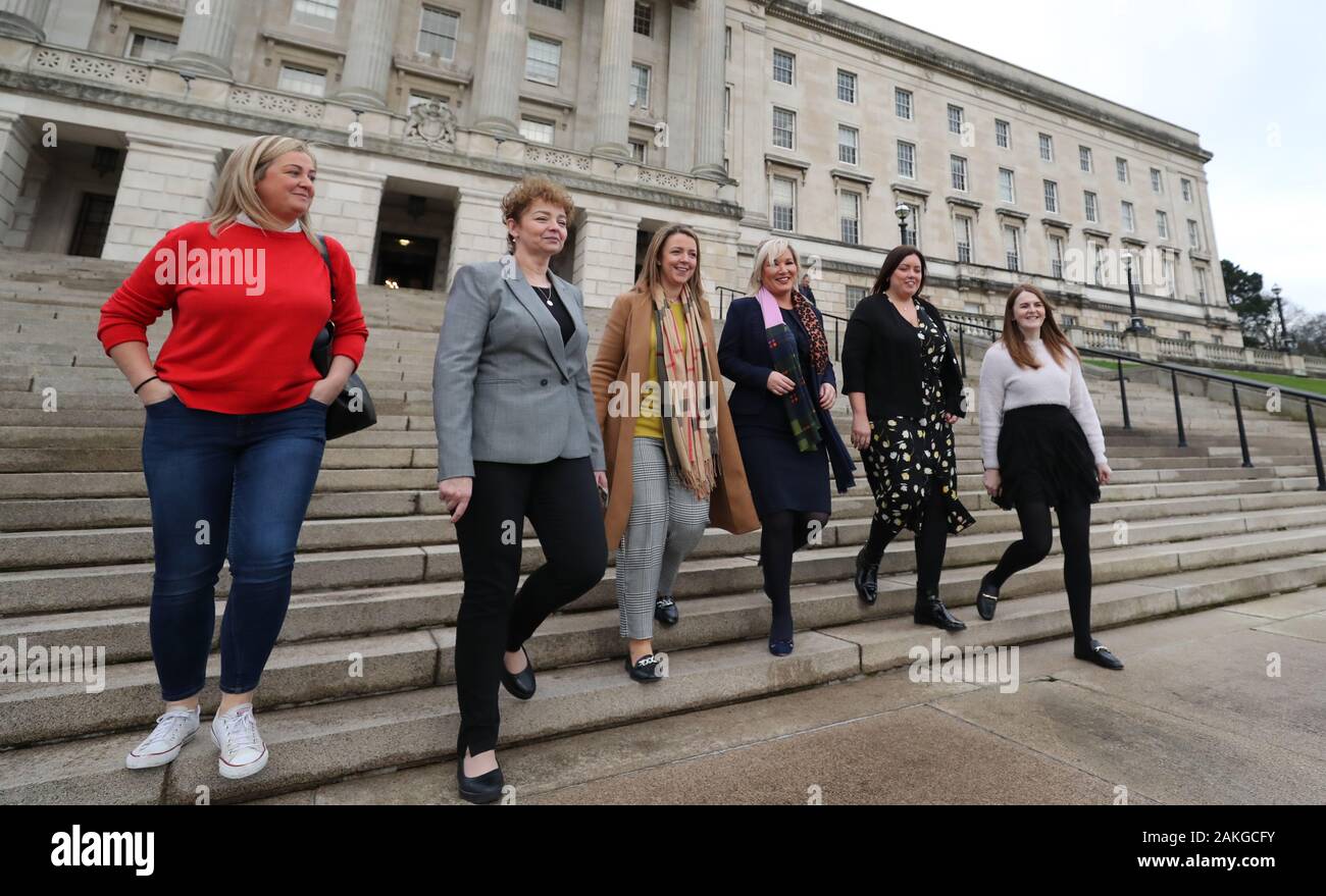 Sinn Fein's Caral Ni Chuilin (second left), Sinad Ennis (far left), deputy leader Michelle O'Neill and Caoimhe Archibald (far right) alongside the party's two new co-opted Members of the Legislative Assembly (MLA) Liz Kimmins (third from left) and Deirdre Hargey (second Right) outside the Stormont Parliament buildings in Belfast, as the deadline approaches for the resumption of a power sharing assembly in Northern Ireland. Stock Photo