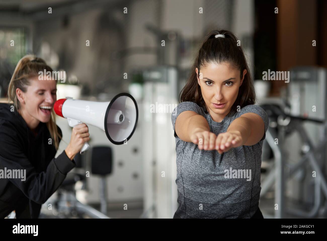 Exercise challenges of young woman Stock Photo - Alamy