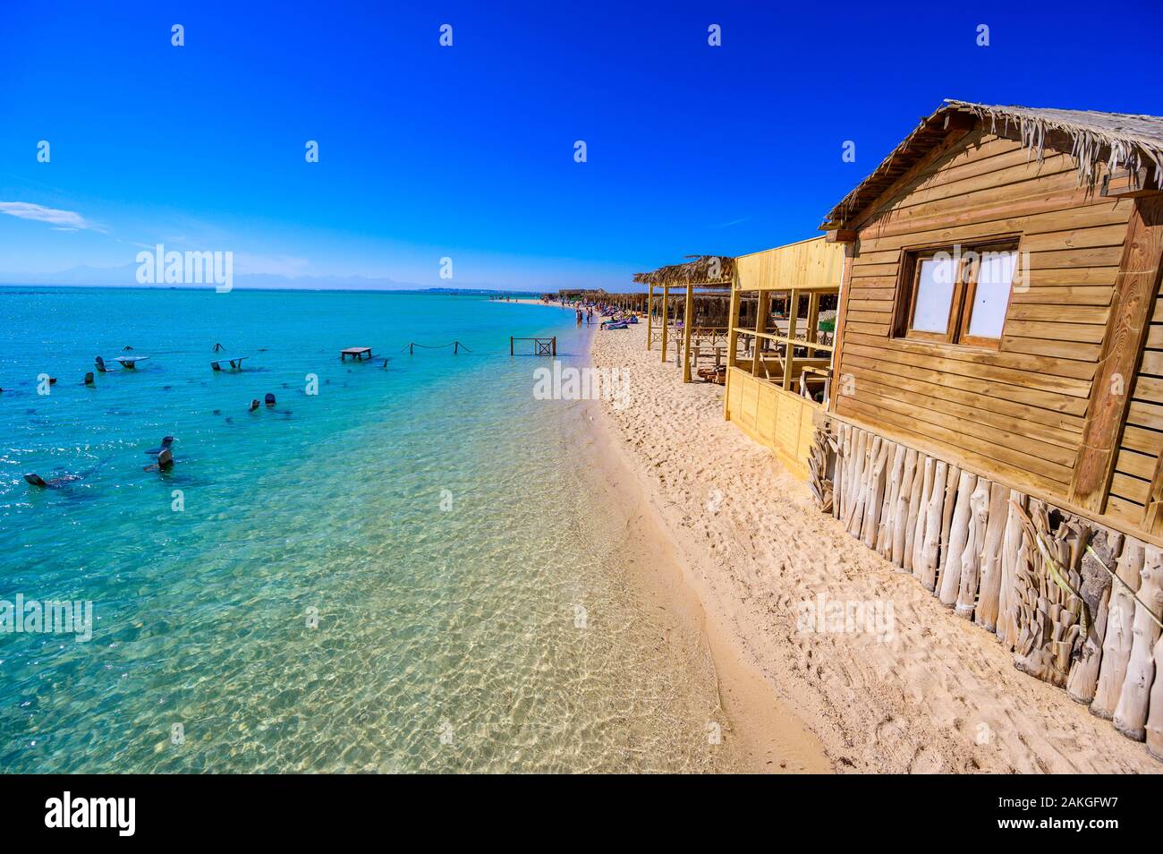 Orange Bay Beach with crystal clear azure water and white beach - paradise coastline of Giftun island, Mahmya, Hurghada, Red Sea, Egypt. Stock Photo