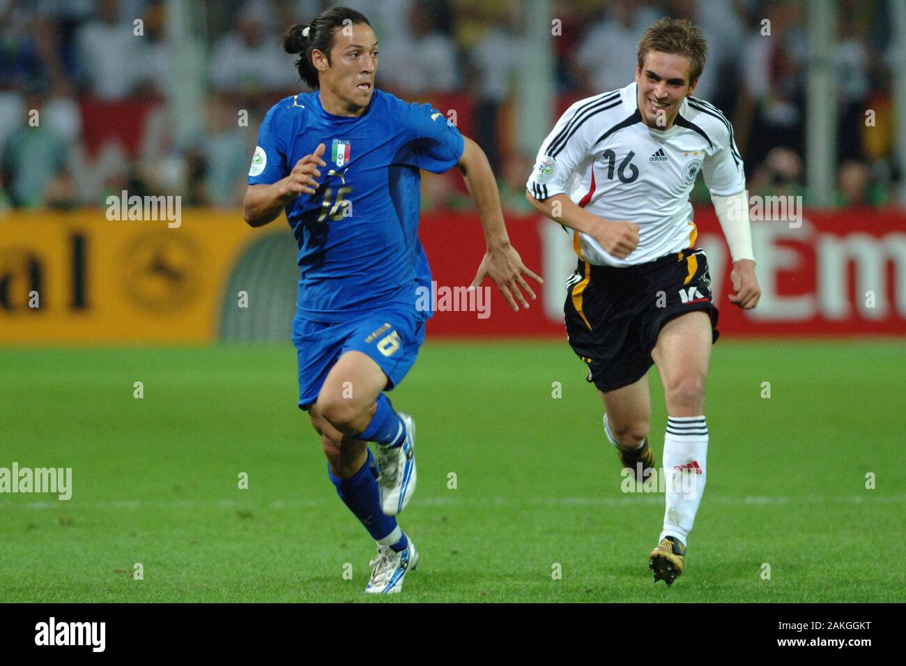 Dortmund Germany, 4 July 2006, FIFA World Cup Germany 2006, Germany-Italy semi-final at the Westfalenstadion: Mauro German Camoranesi and Philipp Lahm in action during the  match Stock Photo