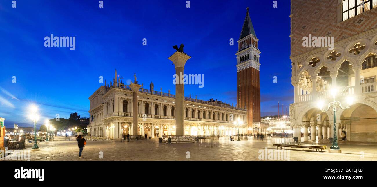 Italy, Veneto, Venice listed as World Heritage by UNESCO, San Marco district, Saint Mark's Square (Piazza San Marco), the Palazzo Ducale (Doge's palace), the two colums headed with Saint Theodore and the Lion of Venice, the libreria building and the bell tower of Saint Mark's basilica (Basilica di San Marco) in the background Stock Photo
