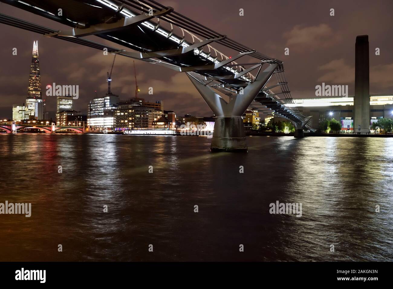 United Kingdom, London, the Millenium Bridge, The Shard, the tallest tower in London by Renzo Piano, and the Tate Modern in the background Stock Photo
