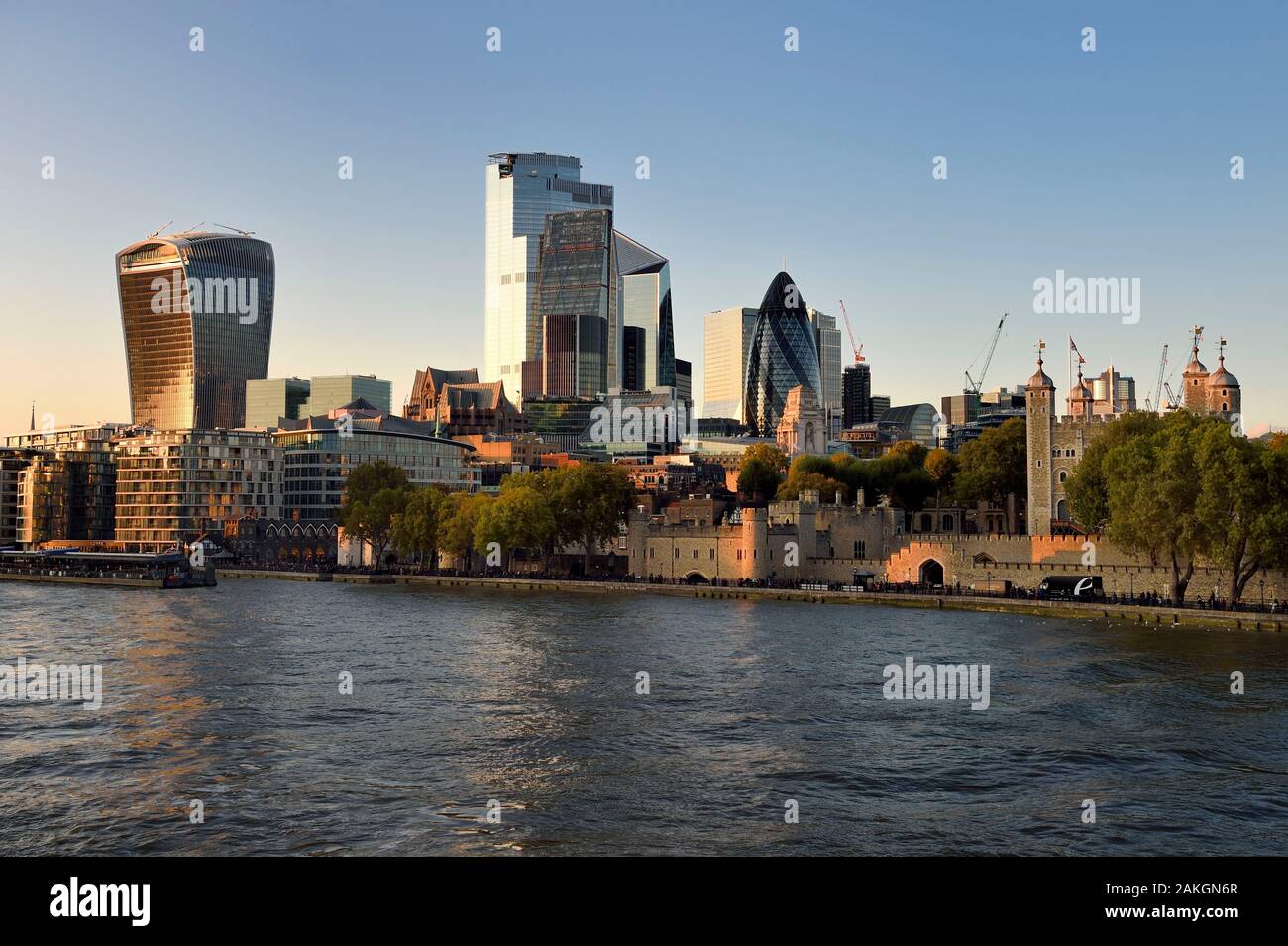 United Kingdom, London, the River Thames, the Tower of London, the City with its skyscrapers, the tower known as the Walkie Talkie designed by architect Rafael Viñoly, Tower 30 St Mary Axe or Swiss Re Building also known as the gherkin designed by architect Norman Foster Stock Photo