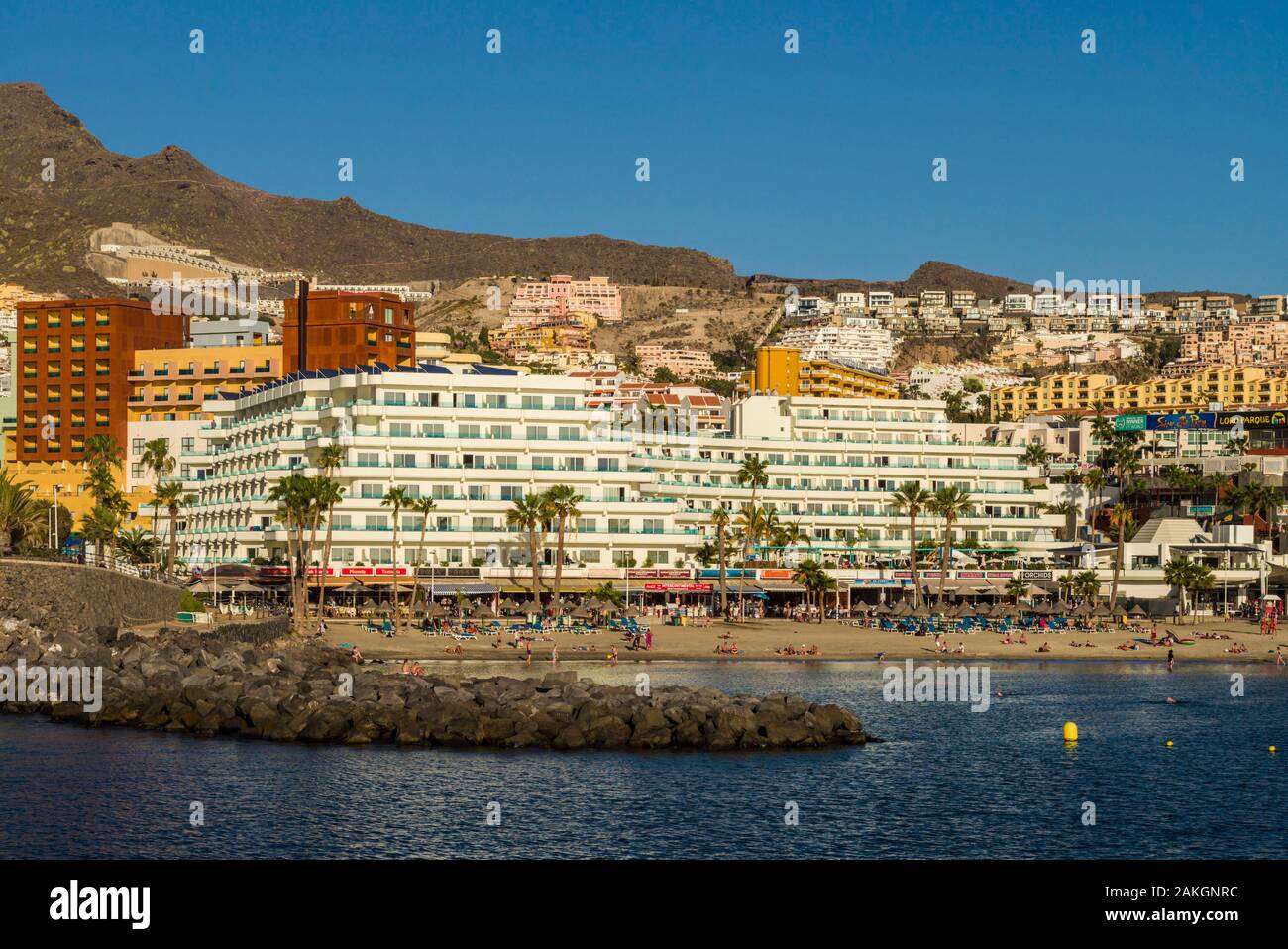 Spain, Canary Islands, Tenerife Island, Playa de Las Americas, Puerto Colon, resort view, sunset Stock Photo