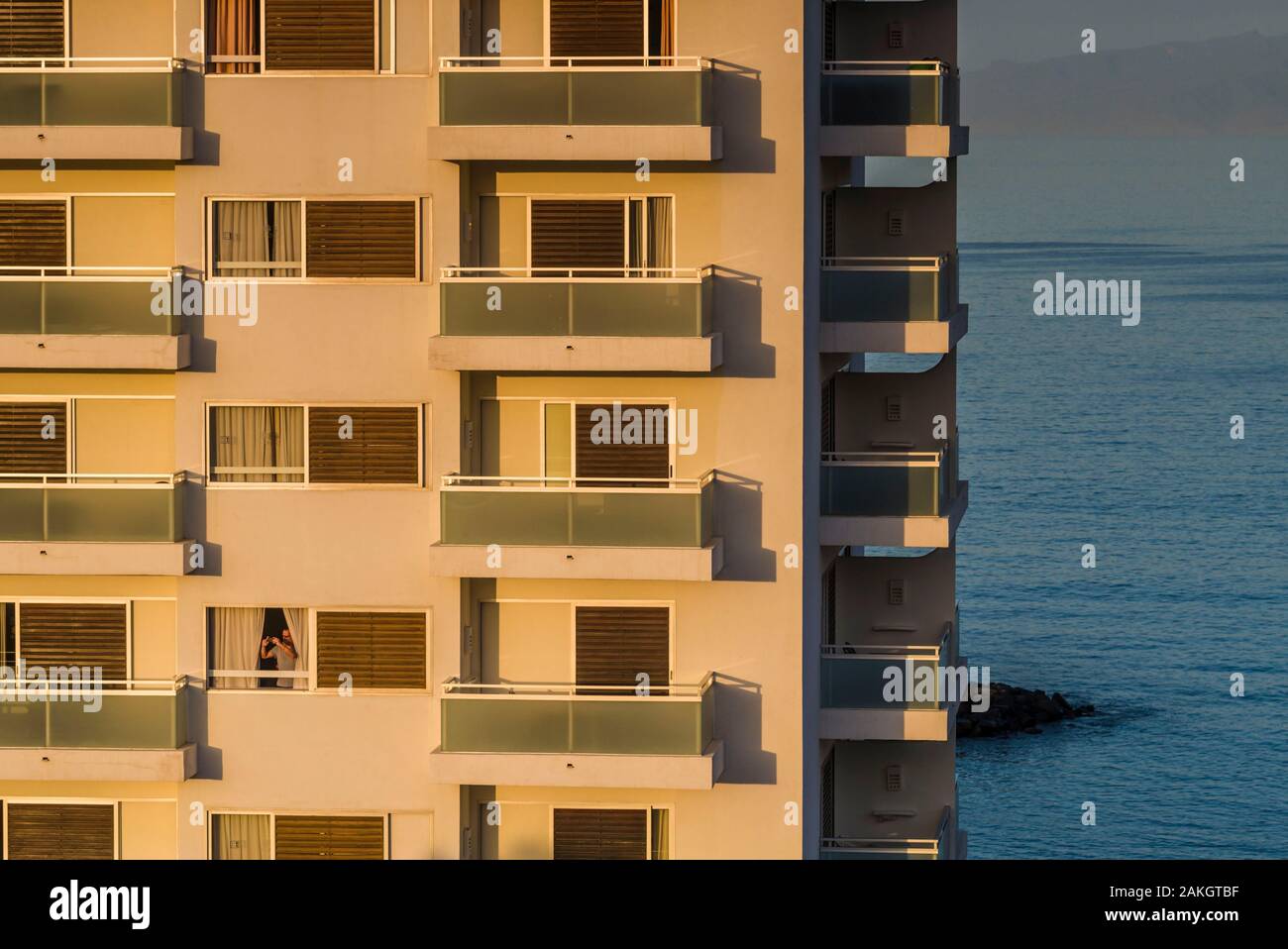 Spain, Canary Islands, Tenerife Island, Playa de Las Americas, elevated view of resort area, dawn Stock Photo