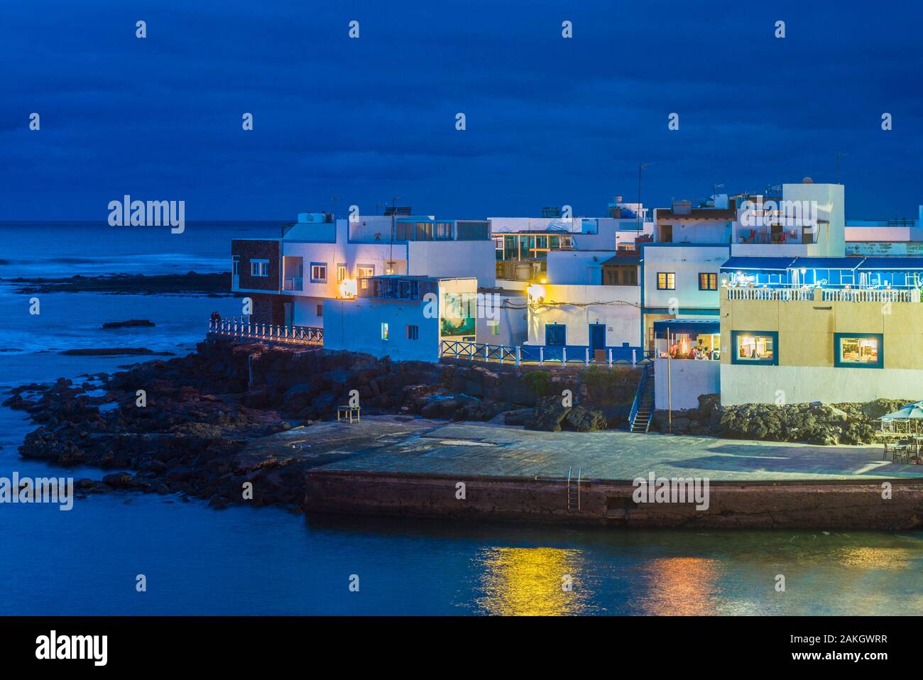 Spain, Canary Islands, Fuerteventura Island, El Cotillo, Fishermans Quarter, dusk Stock Photo