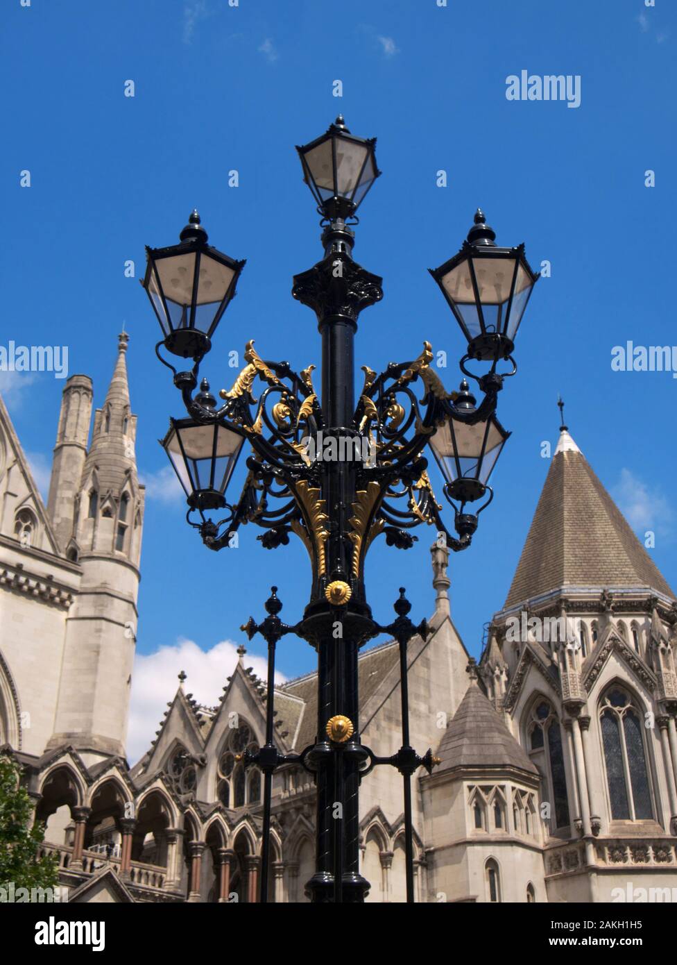 Decorative Victorian lampost outside the Royal Courts of Justice, London Stock Photo