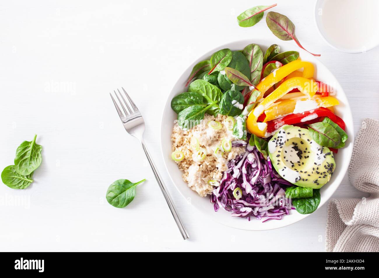 veggie couscous lunch bowl with avocado, bell peppers, spinach and red cabbage Stock Photo Alamy