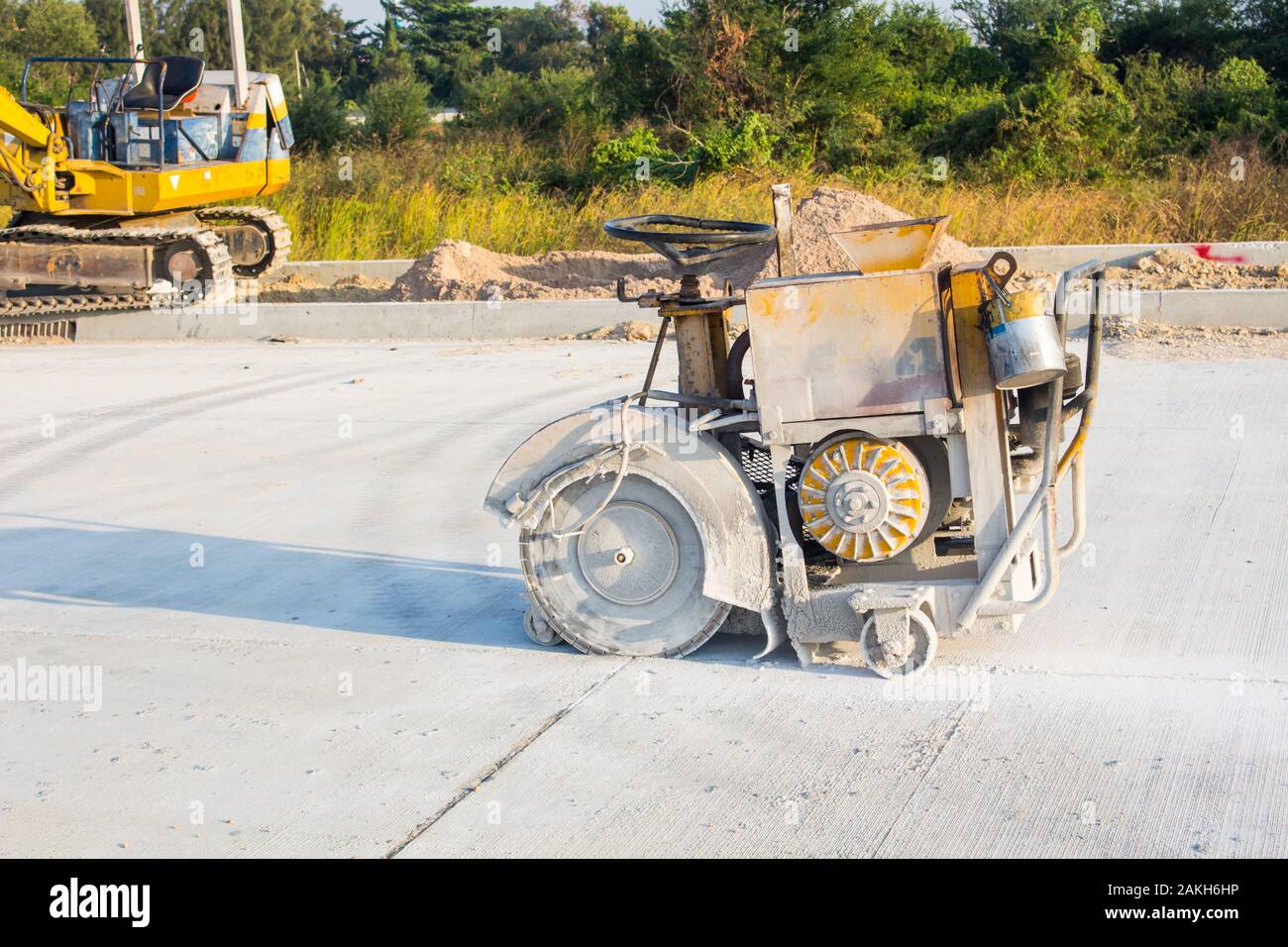 The joint cutter machine on a brushed concrete surface. Construction