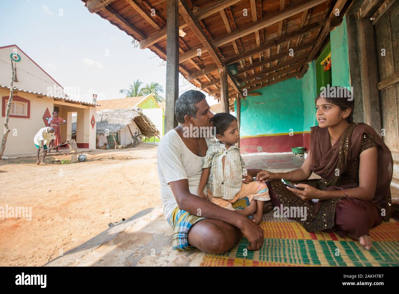 CAPTION: Gathering community data. Mobility India and CBM have partnered with Aptivate to develop a simple means of collecting key project-relevant da Stock Photo