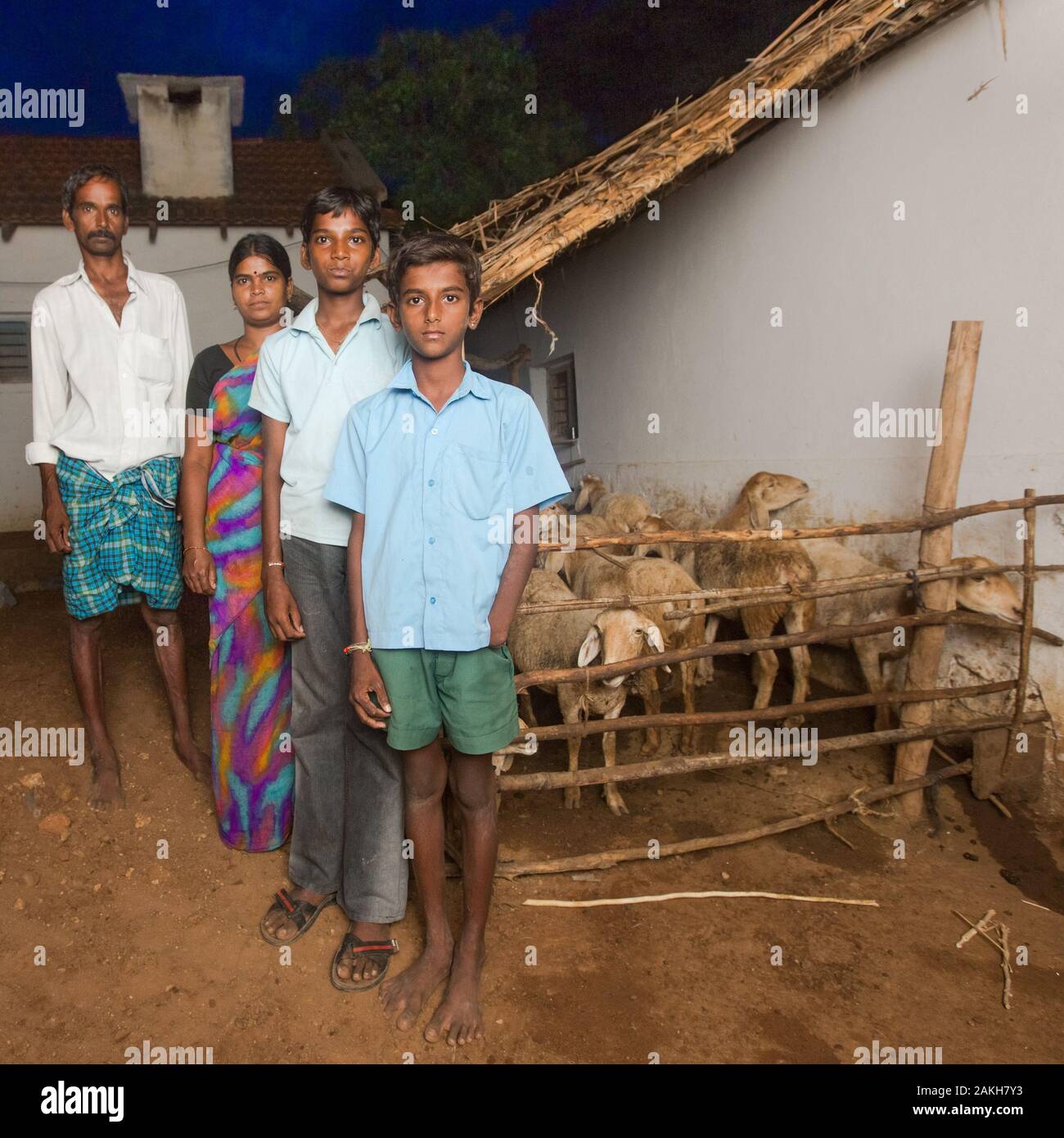 CAPTION: Following an accident, Pradeep (pictured, front) had to have his hand amputated. In order to ensure he'd be able to meet the costs associated Stock Photo
