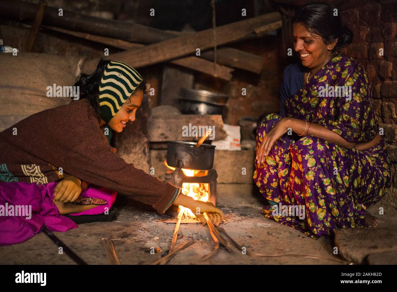 CAPTION: Sheela has a small business making food and drinks for local schoolchildren. Through this, she is able to support her daughter Nandini, who h Stock Photo