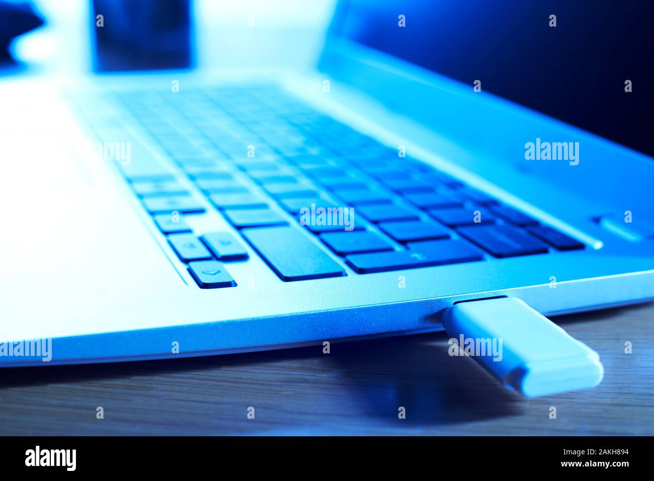Data Being Illegally Downloaded From Computer Onto Memory Stick Stock Photo