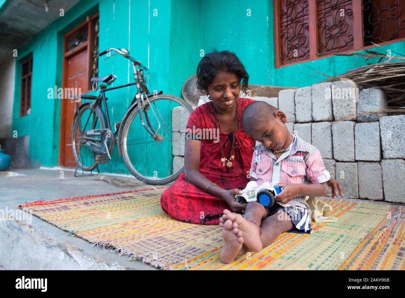 CAPTION: Mallesh has a severe learning disability. He needs almost constant care. During the earliest days following the birth of a child who has (or Stock Photo