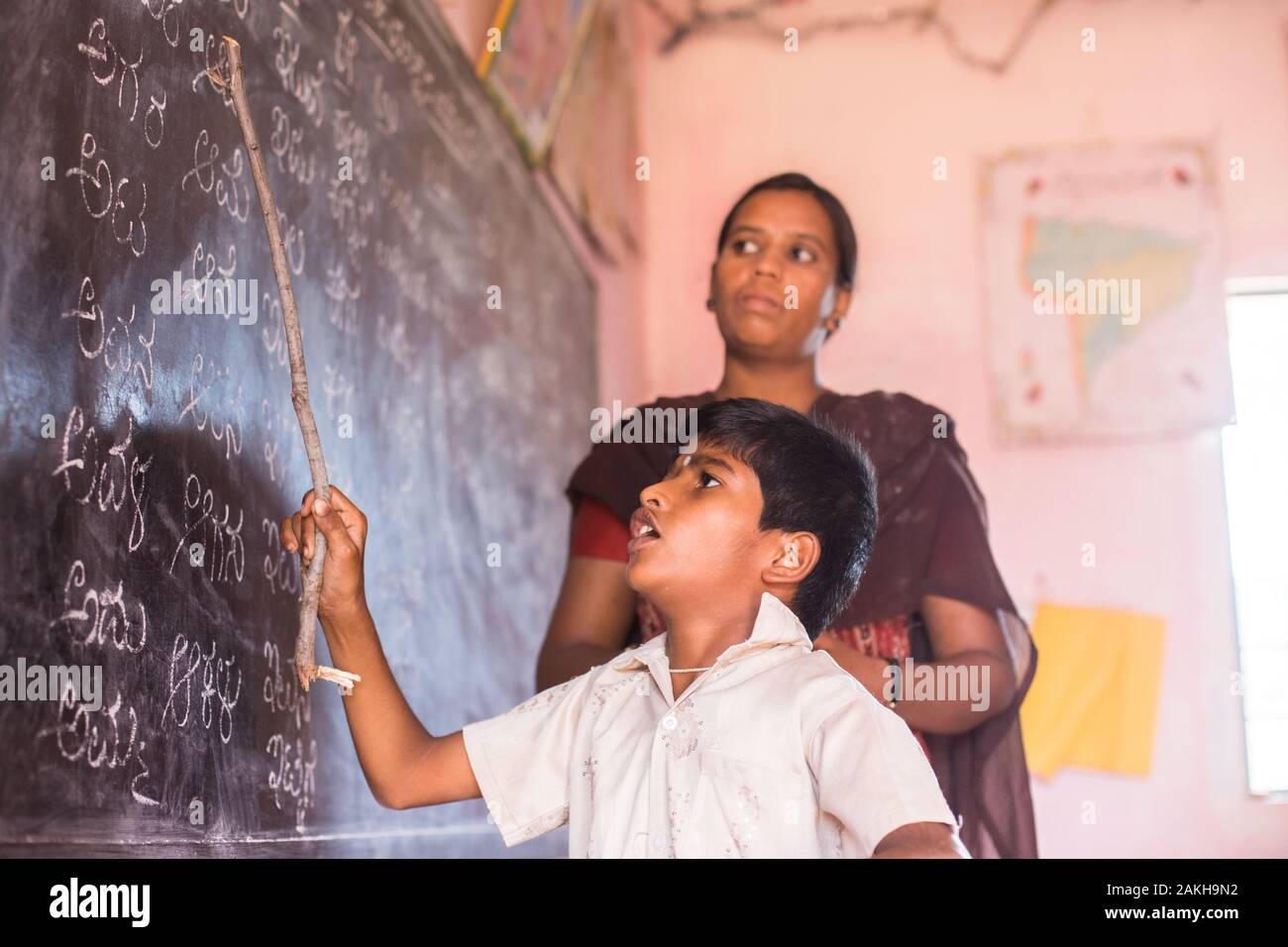 CAPTION: Until the age of five, Naveen - who has cerebral palsy - was confined to his bed. That was the point at which he got his first life-changing Stock Photo