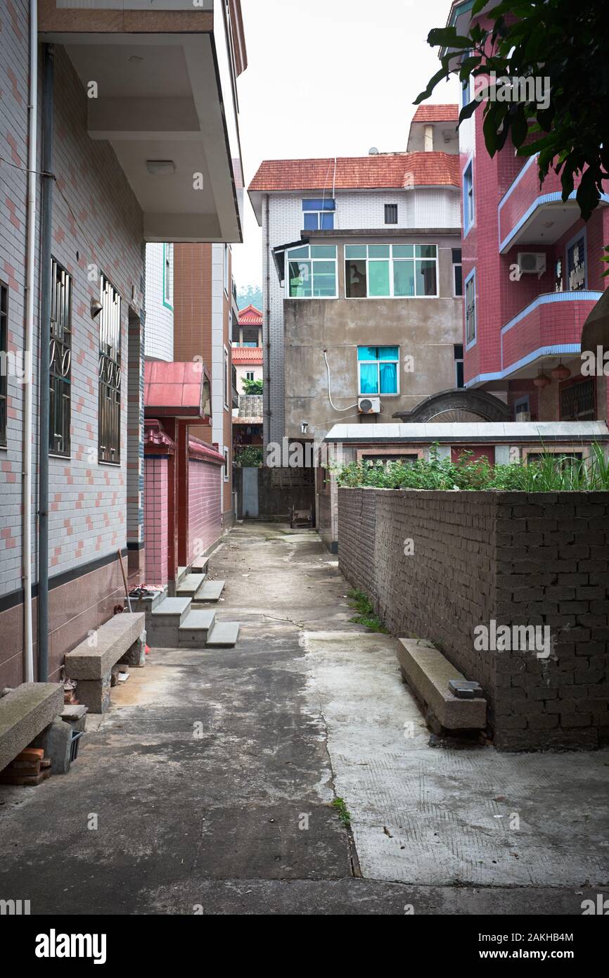 Alley behind houses in Chinese Village Stock Photo