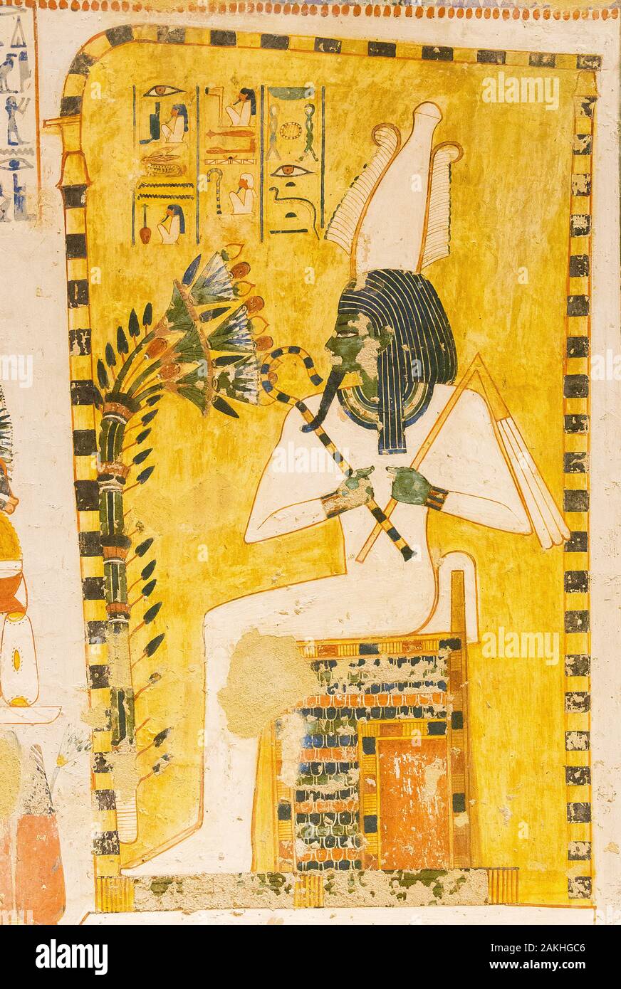 UNESCO World Heritage, Thebes in Egypt, Valley of the Nobles, tomb of Menna. Osiris in his kiosk smells lotus and papyrus. Stock Photo