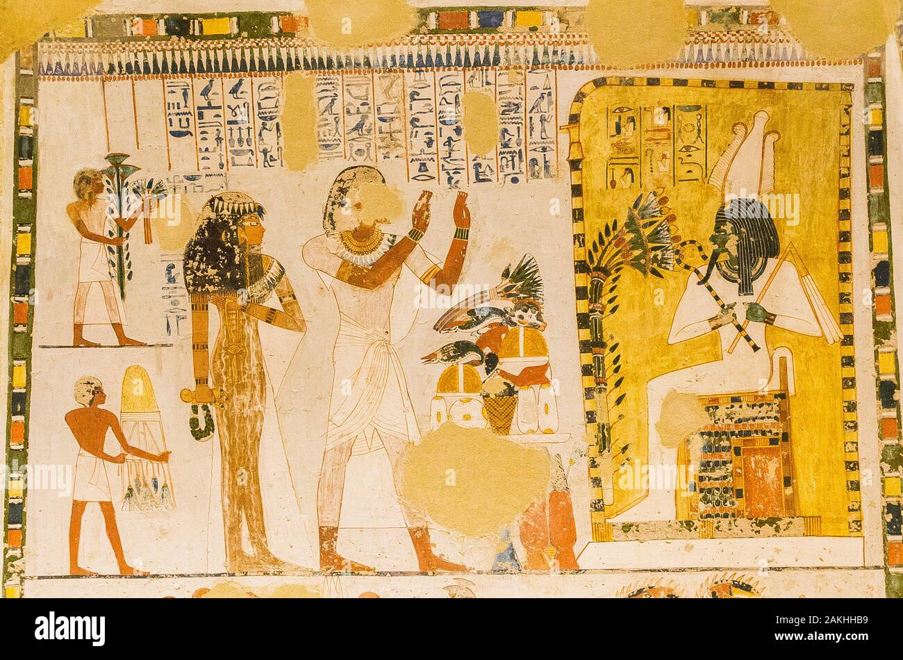UNESCO World Heritage, Thebes in Egypt, Valley of the Nobles, tomb of Menna. Menna and his wife pray the god Osiris and give him offerings. Stock Photo