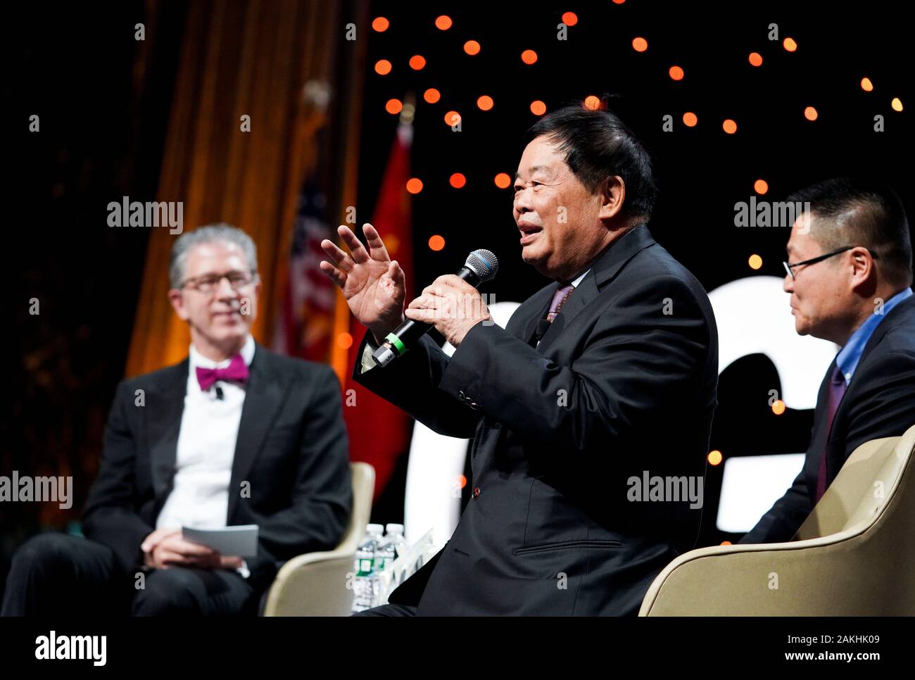 New York, USA. 8th Jan, 2020. Cao Dewang (C), chairman and founder of Chinese Fuyao Group, attends a fireside chat during the 15th anniversary and Chinese Lunar New Year gala of China General Chamber of Commerce-U.S.A. in New York, the United States, Jan. 8, 2020. Credit: Wang Ying/Xinhua/Alamy Live News Stock Photo