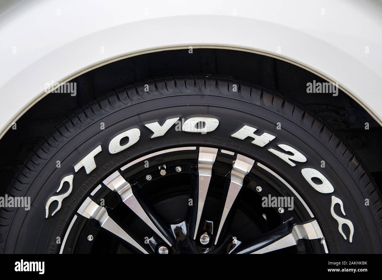 KYOTO, JAPAN - OCTOBER 11, 2016: Detail of Toyo H20 tyre on a car in Kyoto, Japan. Toyo tires are manufactured in Japanese Toyo Tire Corporation, foun Stock Photo