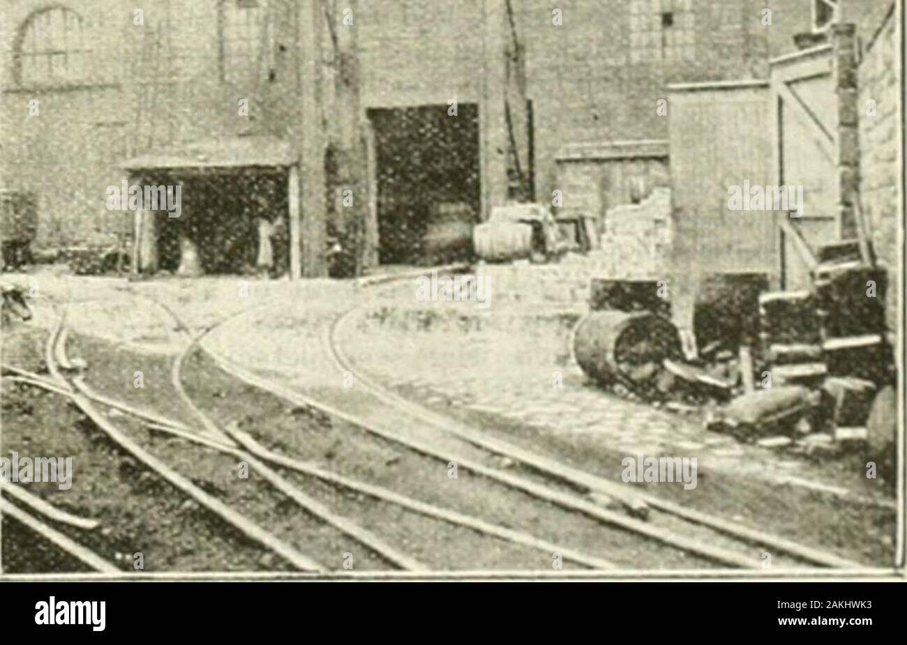 The Surveyor and municipal engineer . .^?r^^^ -1;. KiiiNBUiicir: EA.-iT End of Boiler-IIulsi; at the Ckxtii.il Electric Lighting Station, showing Ei.kctric Coai, Hoist and Aitomatio Wkighing Machink fob Railway Triiks. having a capacity of SoO ampere hours, at a discharge rate of 180 amperes. Tho Imtterios are always connected to the ouinibus bars on the switchboard, but, ns tho prossuio of tho dynamos is not sulliciont to charge all tho cells at onc«, motor generators or boosters are used ; these are put iu scriei with the dynamos, and are capable of iccnnsingtho prostnro of the battery circu Stock Photo