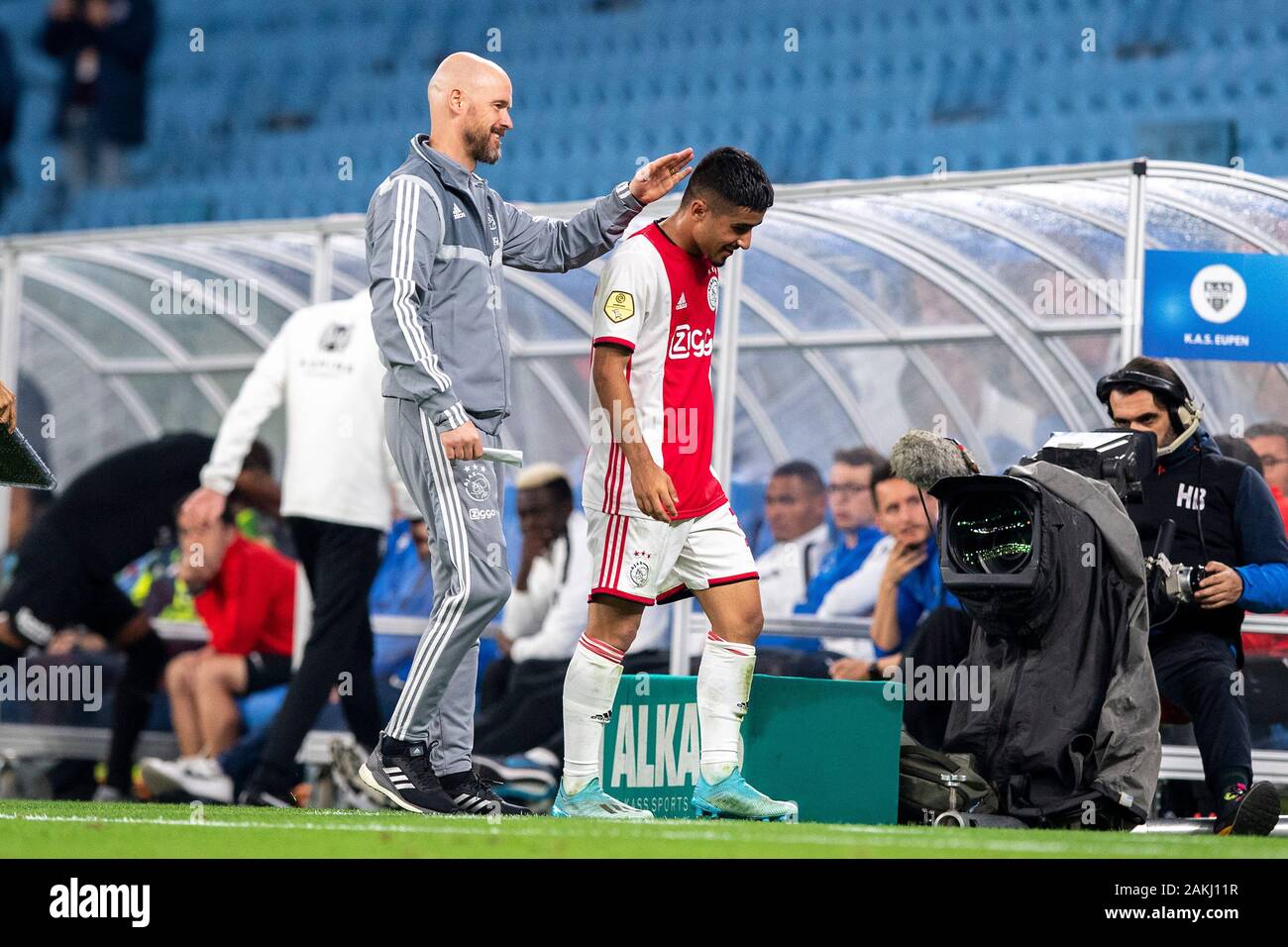 Doha, Qatar. 09th Jan, 2020. DOHA, 09-01-2020, Al Janoub Stadium, Trainingscamp, friendly, season 2019/2020, Naci Ünüvar and Erik ten Hag during the match Ajax - KAS Eupen Credit: Pro Shots/Alamy Live News Stock Photo