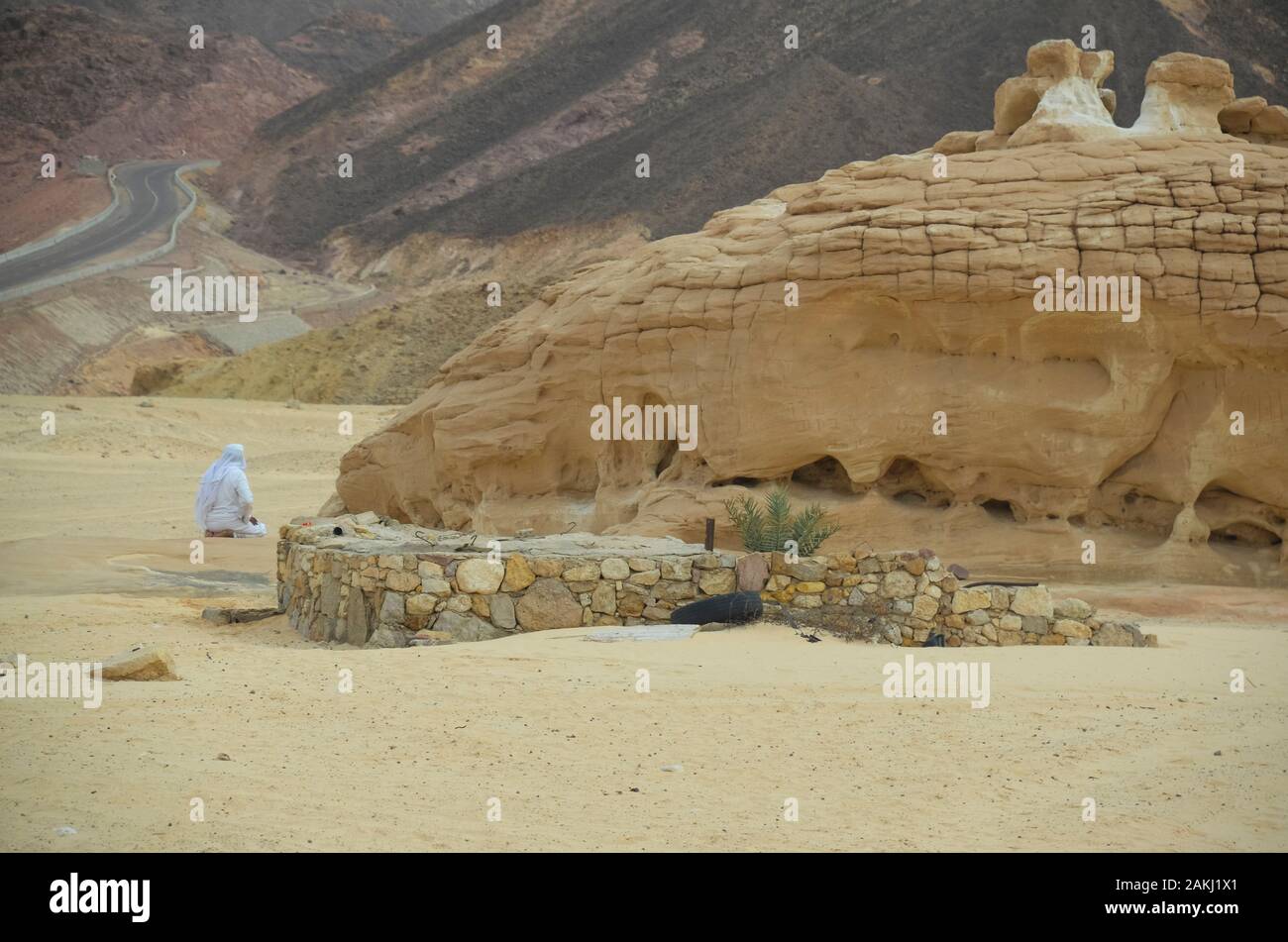 Man praying on his knees hi-res stock photography and images - Alamy