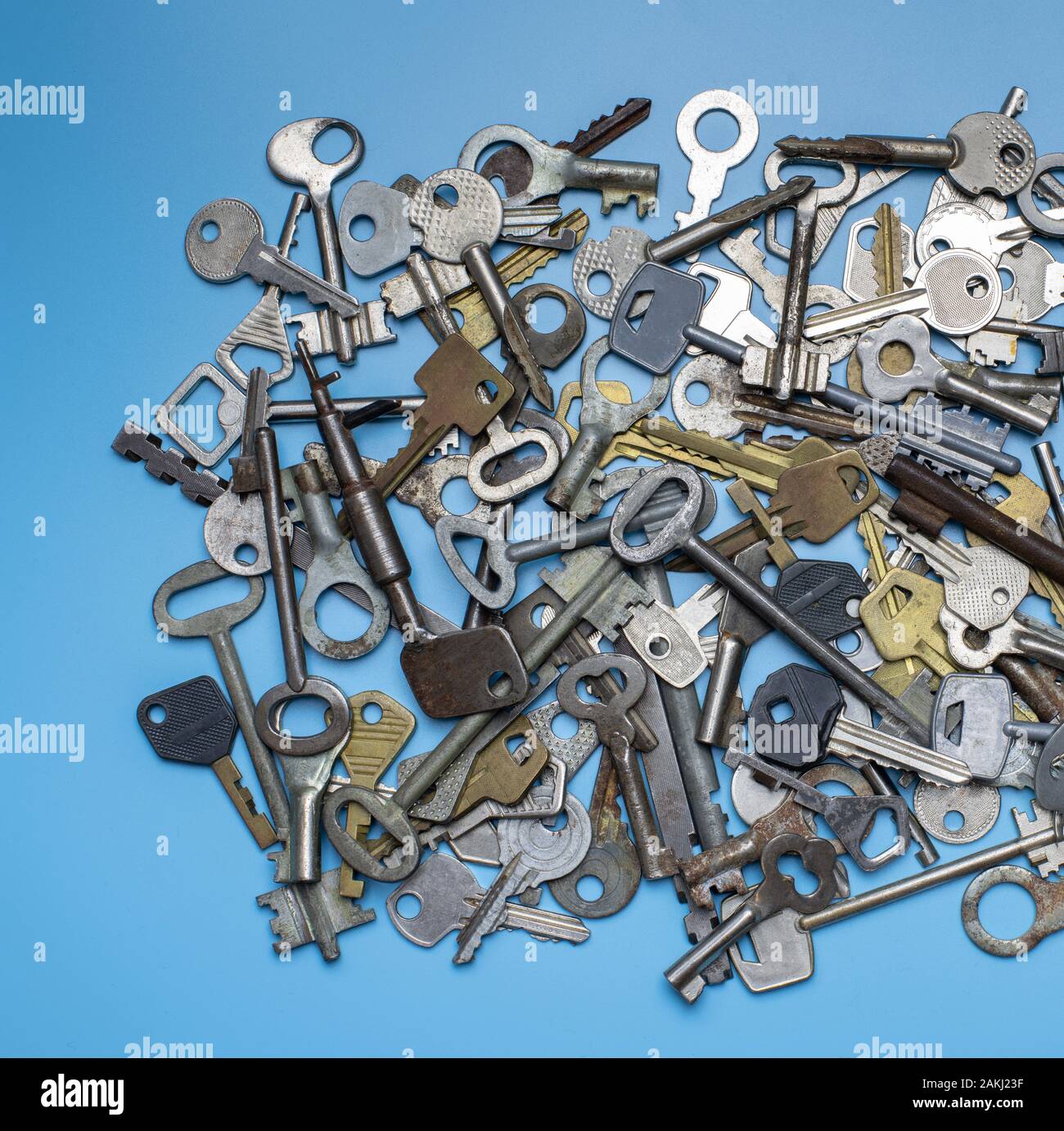 Keys set on blue background. Door lock keys and safes for property ...