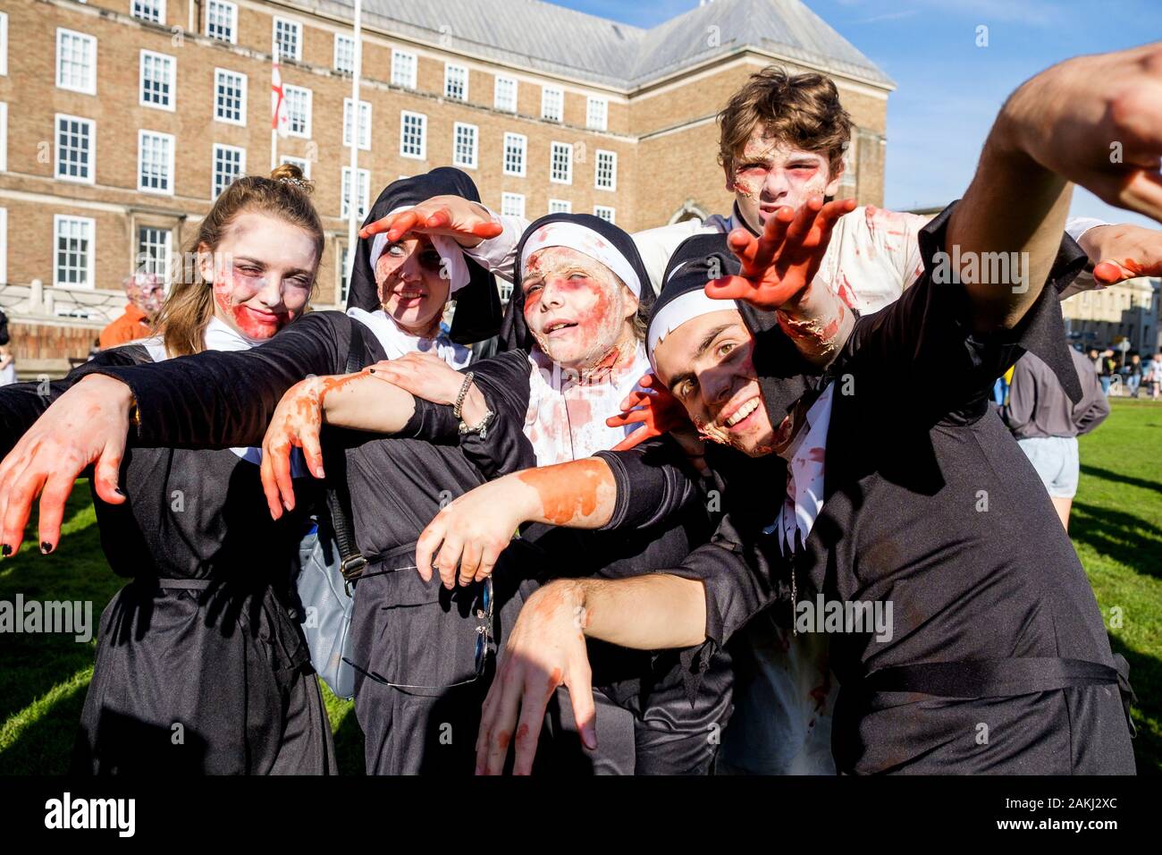 Bristol, UK. 28th Oct, 2017. People dressed as a zombies are pictured as they participate in a zombie walk through the city centre. Stock Photo