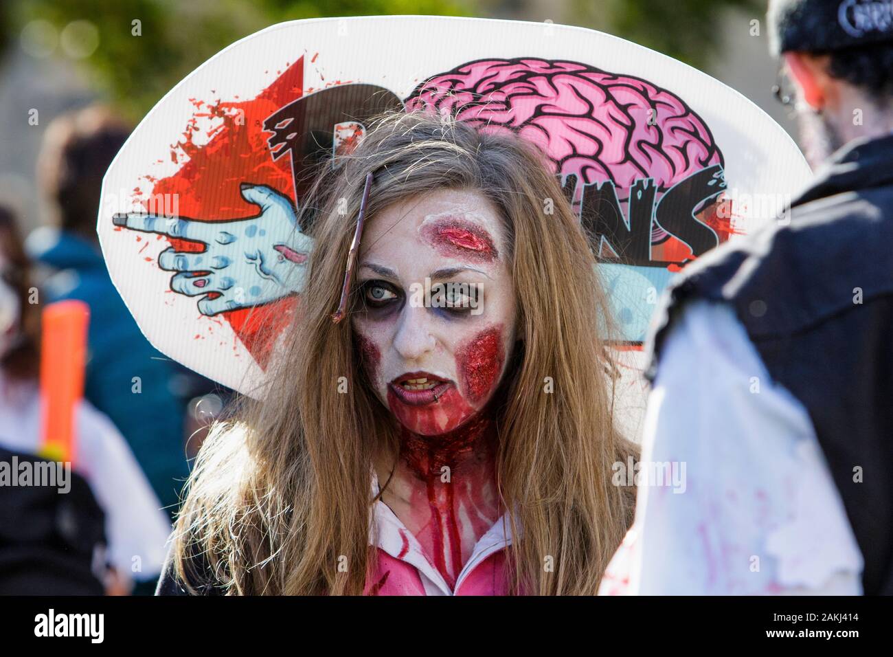 Bristol, UK. 28th Oct, 2017. A woman dressed as a zombie is pictured as she participates in a zombie walk through the city centre. Stock Photo