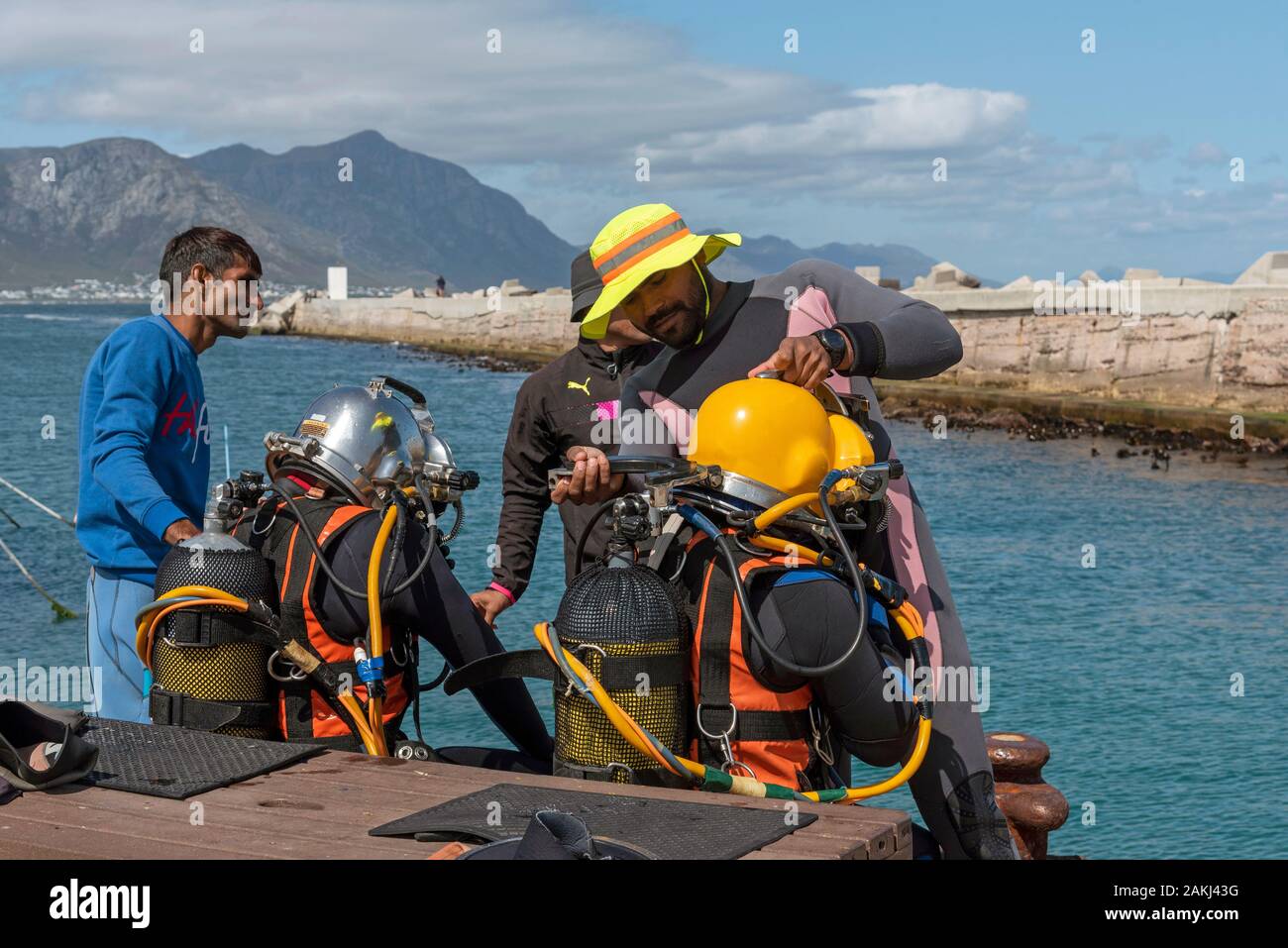 Hermanus, Western cape, South Africa. December 2019. Professional divers training course, Preparing young student diver before going to dive. Stock Photo