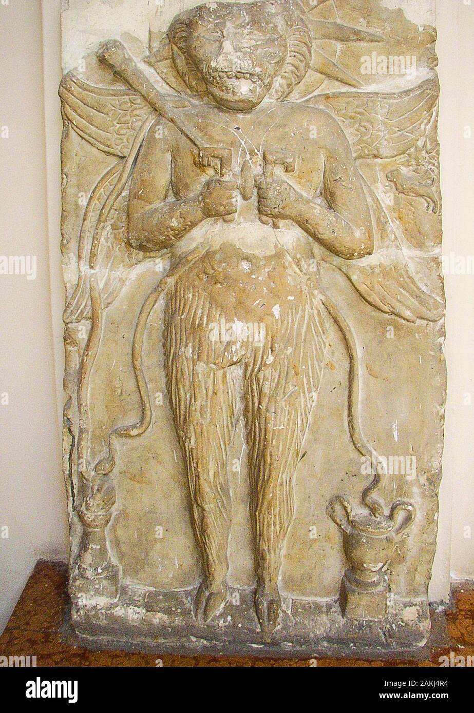 Egypt, Alexandria, Graeco-Roman Museum, statue of Aion Chronos, a winged lion with goat-legs. He holds a scepter, keys and snakes. Stock Photo