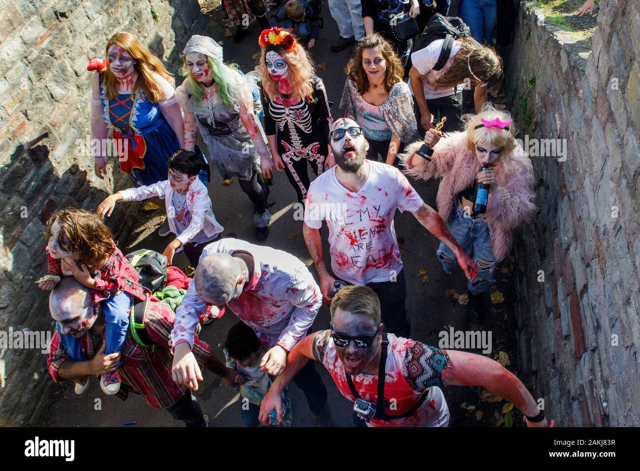 Bristol, UK. 28th Oct, 2017. People dressed as a zombies are pictured as they participate in a zombie walk through the city centre. Stock Photo