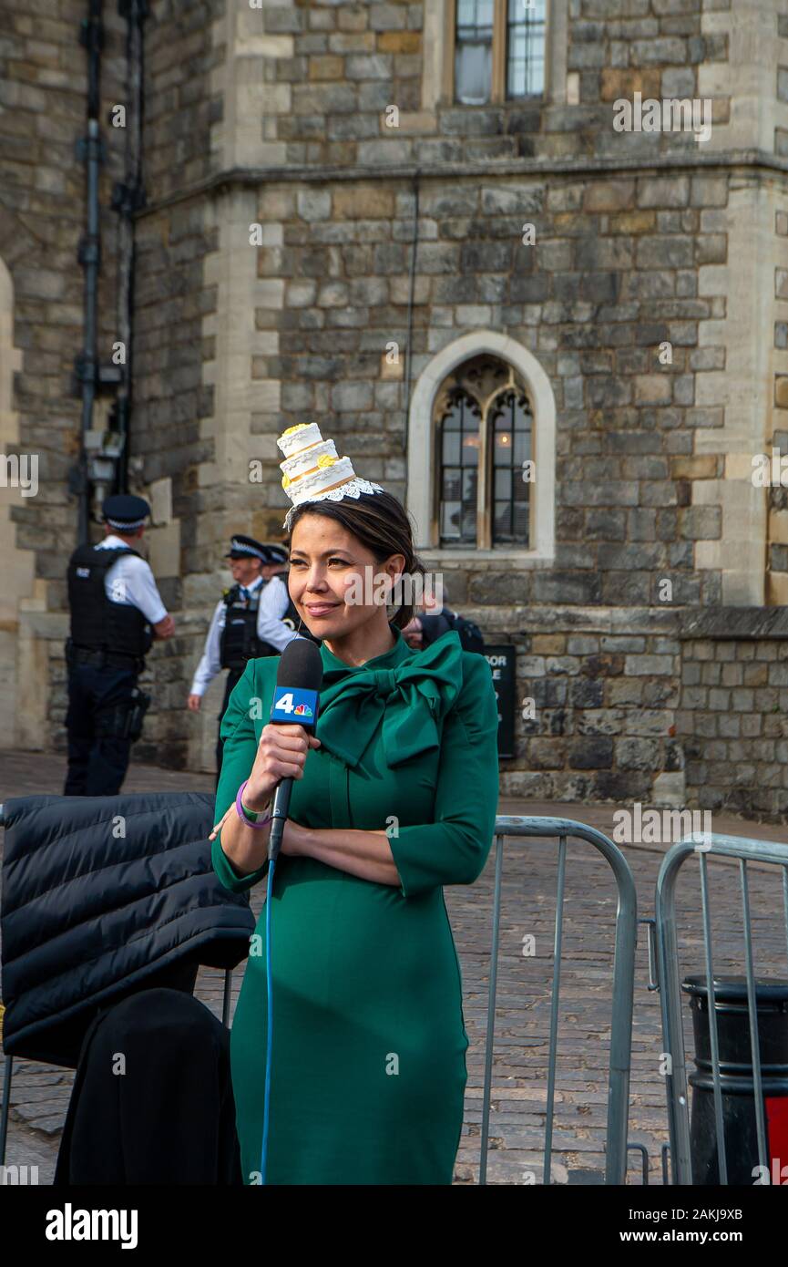 Windsor prepares for the Royal Wedding of Prince Harry and Meghan Markle. 18th May, 2018. A reporter outside Windsor Castle the night before Harry and Meghan’s wedding. Credit: Maureen McLean/Alamy Stock Photo