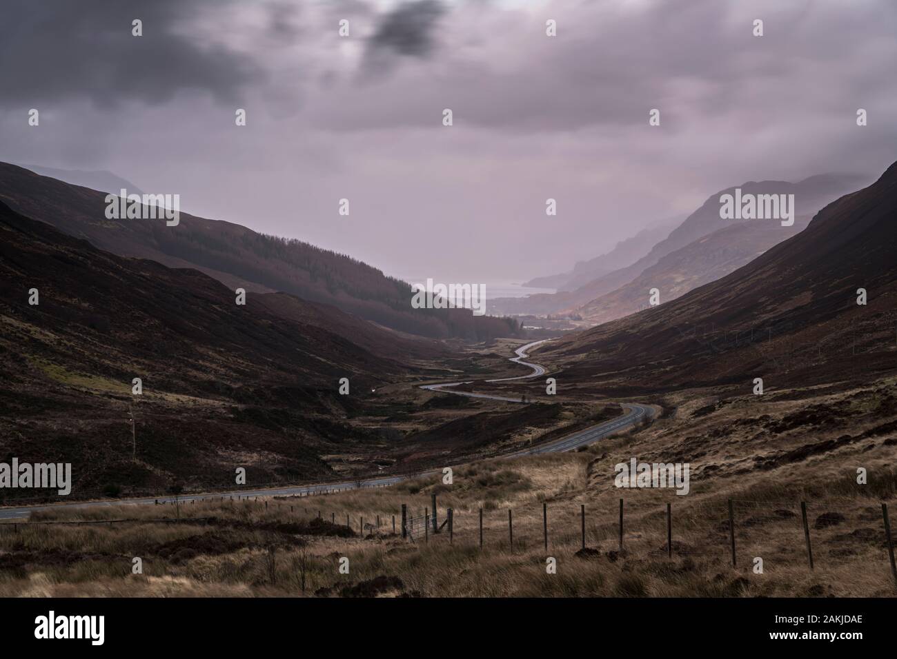 A bracketed HDR winter image looking down Glen Docherty towards Loch maree and Kinlochewe in the rain, Wester Ross, Scotland. 29 December 2019 Stock Photo