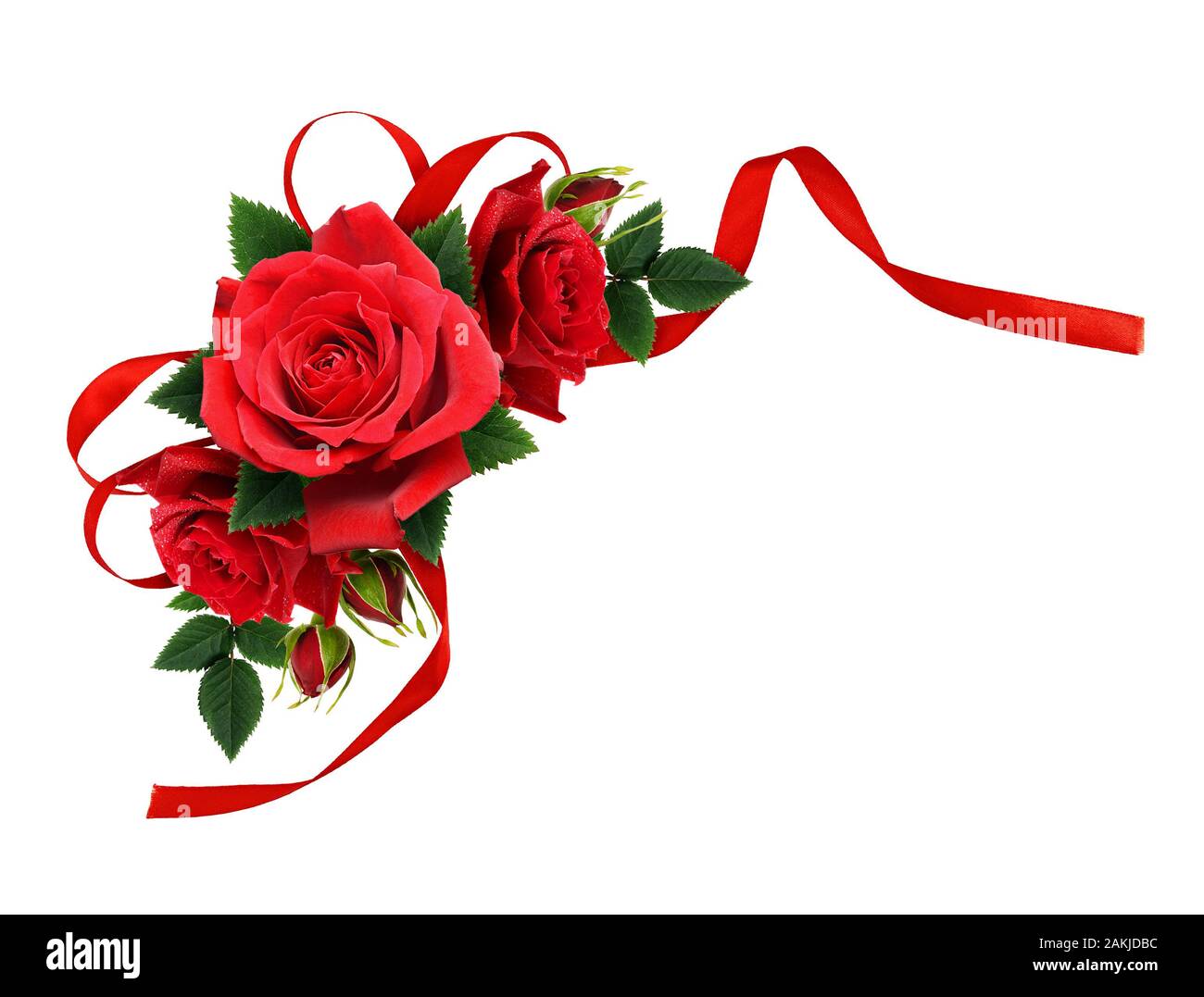 Red rose flowers and silk ribbon bow in corner arrangement isolated on