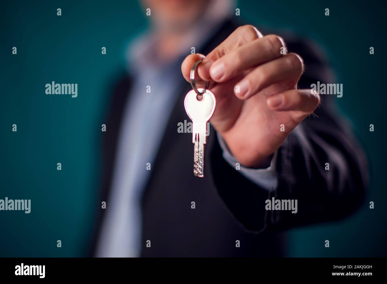 House key in hand hi-res stock photography and images - Alamy