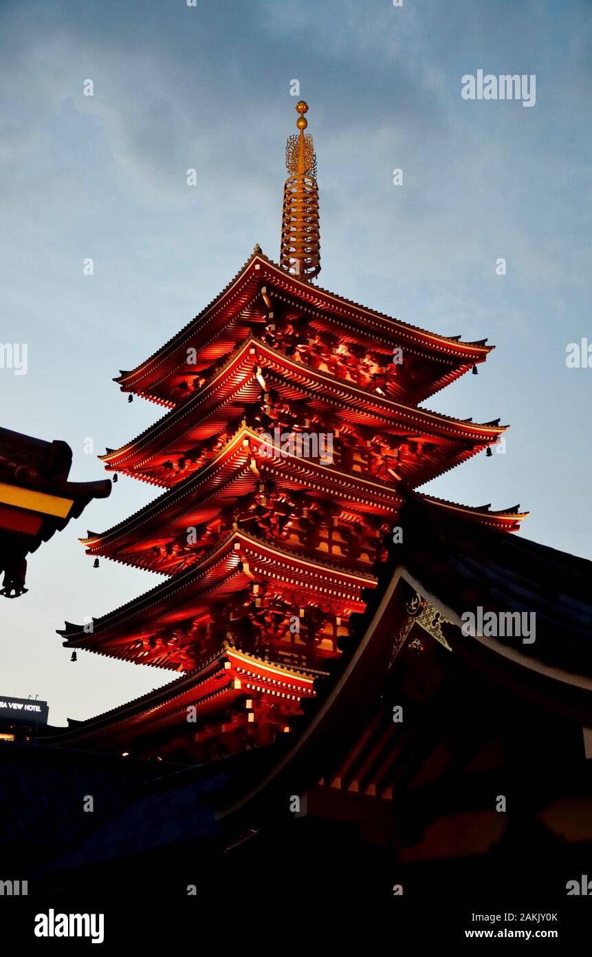 The spectacular Buddhist temple of Sensoji in Asakusa illuminated in the evening. Consisting of 5 floors is the second largest It is located in Tokyo Stock Photo