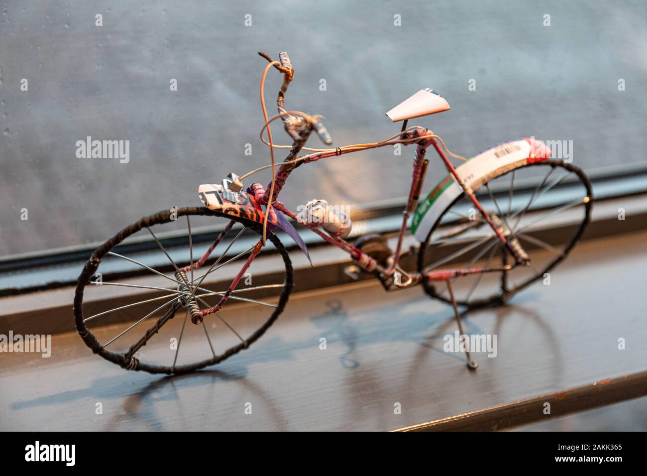 Miniature bicycle for sale at art museum shop Stock Photo